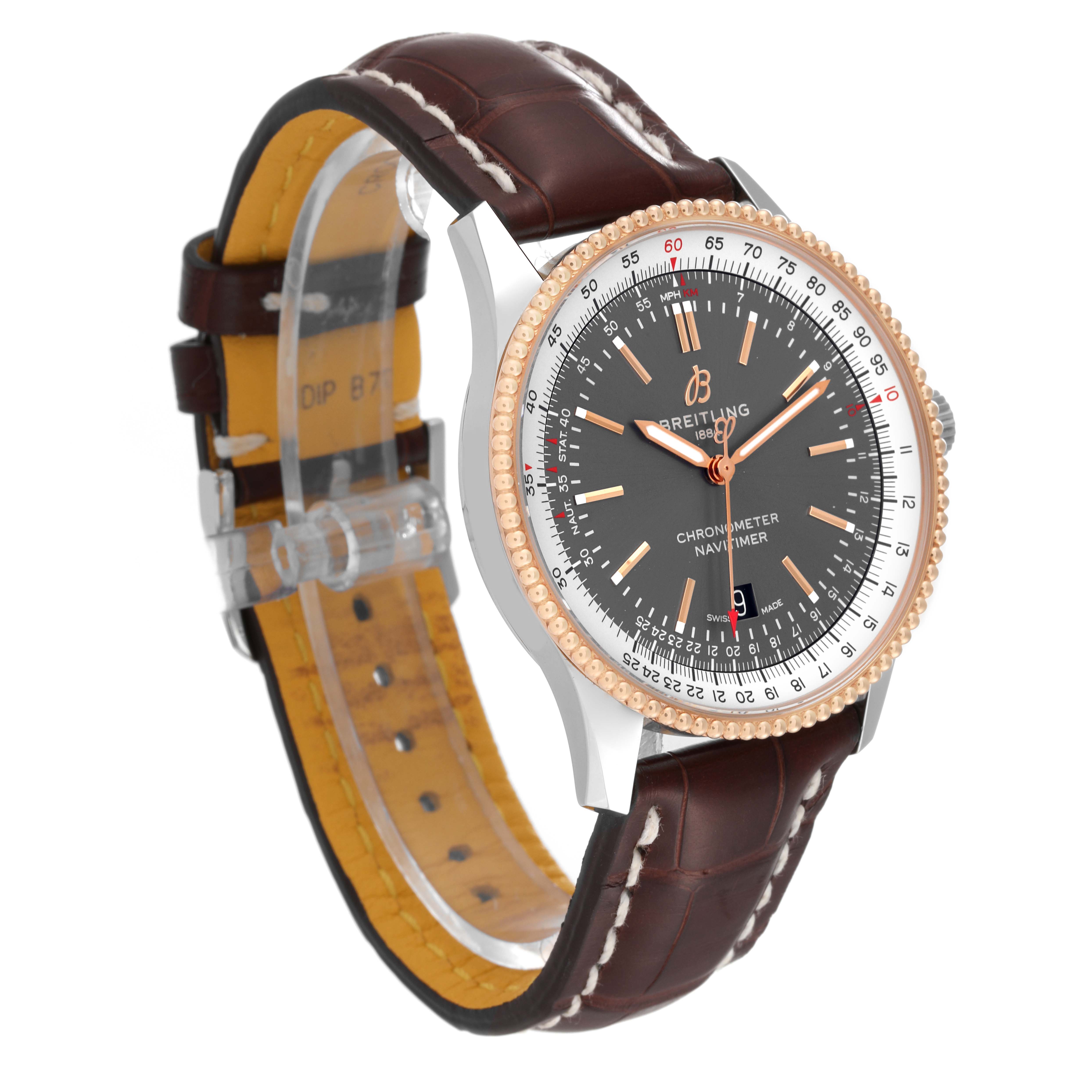 The Breitling Navitimer U17326211M1P1 Men
s Stainless Steel Grey Dial U17326211M1P1 Men
s Stainless Steel Grey Dial watch is shown at a three-quarter angle featuring a dark face, rose gold bezel, and brown leather strap.