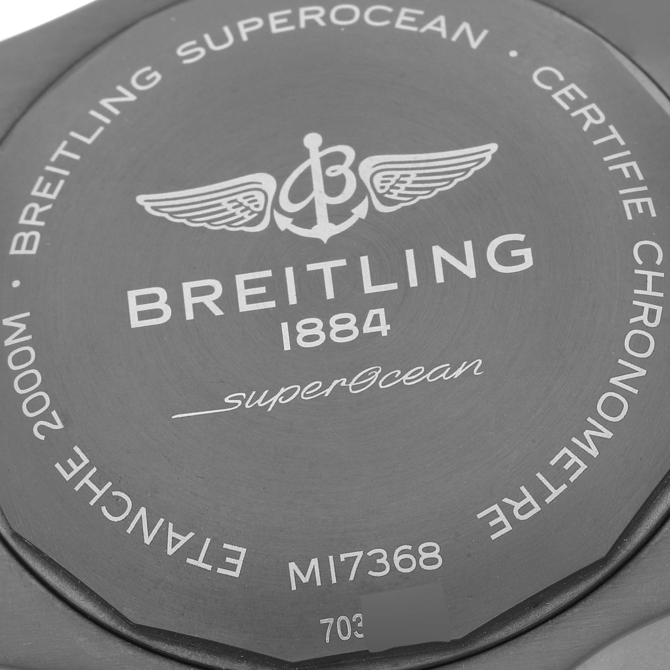 The image shows the back case of the Breitling Superocean M17368 Men's Stainless Steel Blue Dial M17368 Men's Stainless Steel Blue Dial watch, featuring the logo, model details, and water resistance information.