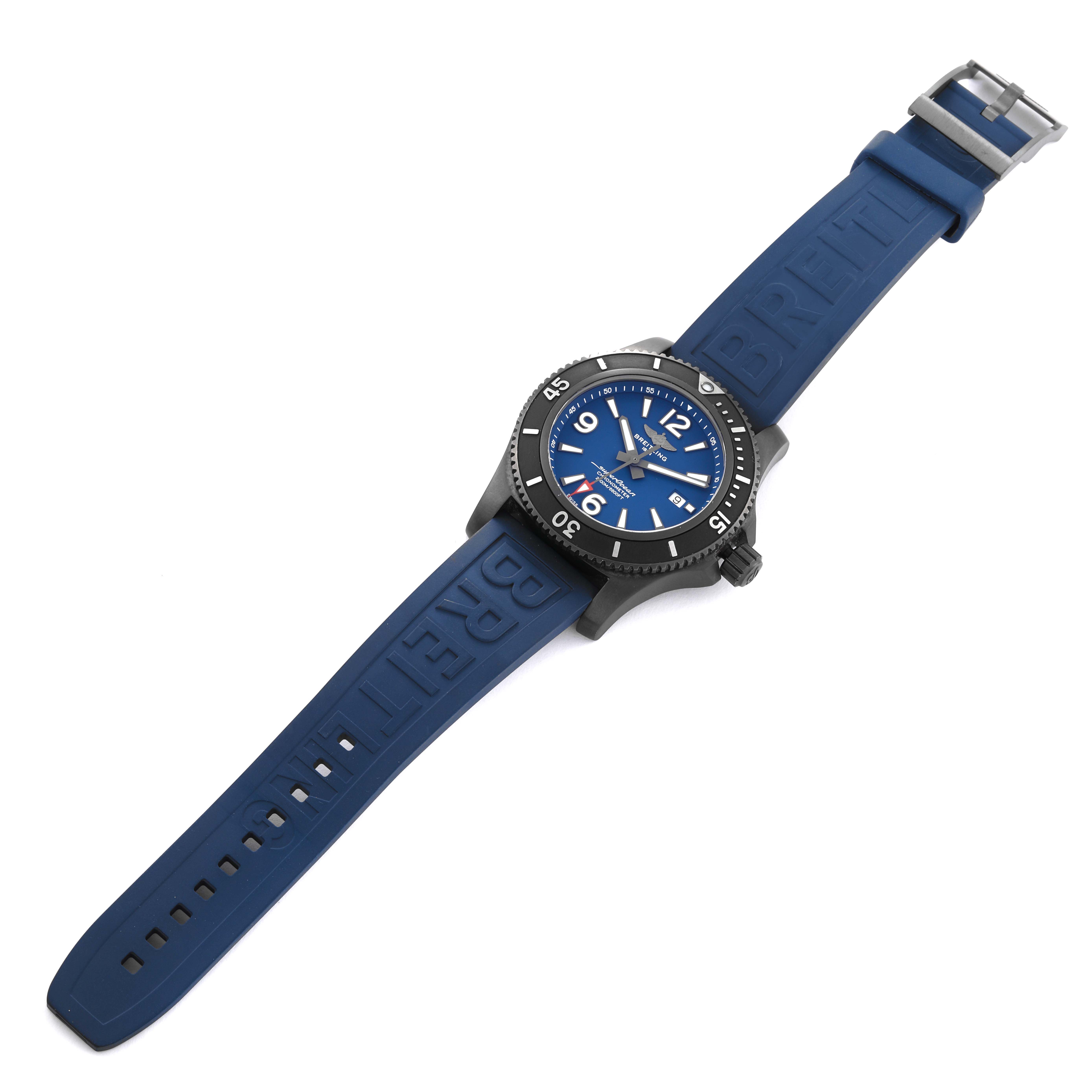 The image shows a Breitling Superocean M17368 Men's Stainless Steel Blue Dial M17368 Men's Stainless Steel Blue Dial watch from a top-down angle, displaying its blue strap, black bezel, and blue dial.