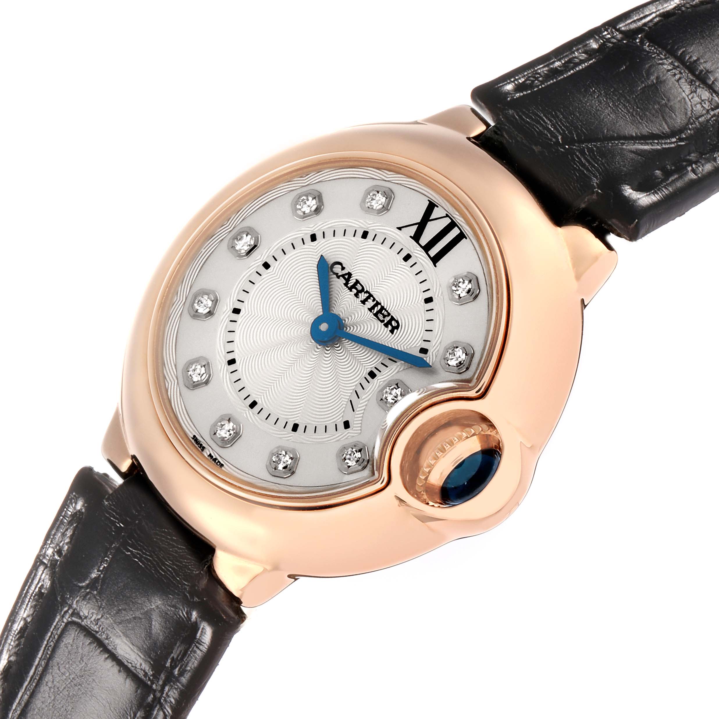 The Ballon Bleu de Cartier watch is shown from a front angle, highlighting the dial, bezel, and leather strap.