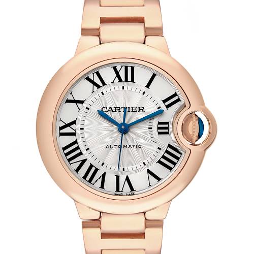 The image shows the Cartier Ballon Bleu W6920096 Women's Rose Gold Silver Dial watch face with rose gold casing, Roman numerals, and the bracelet in a frontal view.