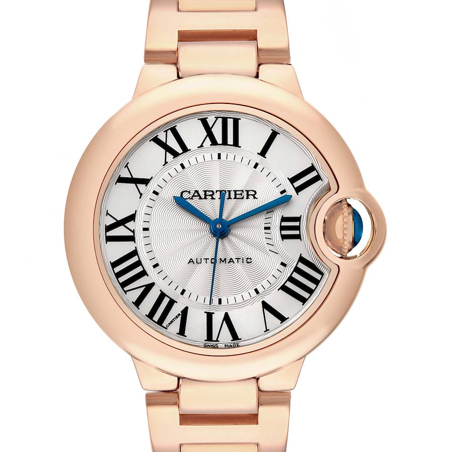 The Cartier Ballon Bleu W6920096 Women's Rose Gold Silver Dial watch is shown from the front, highlighting its round face, Roman numerals, and distinctive crown.