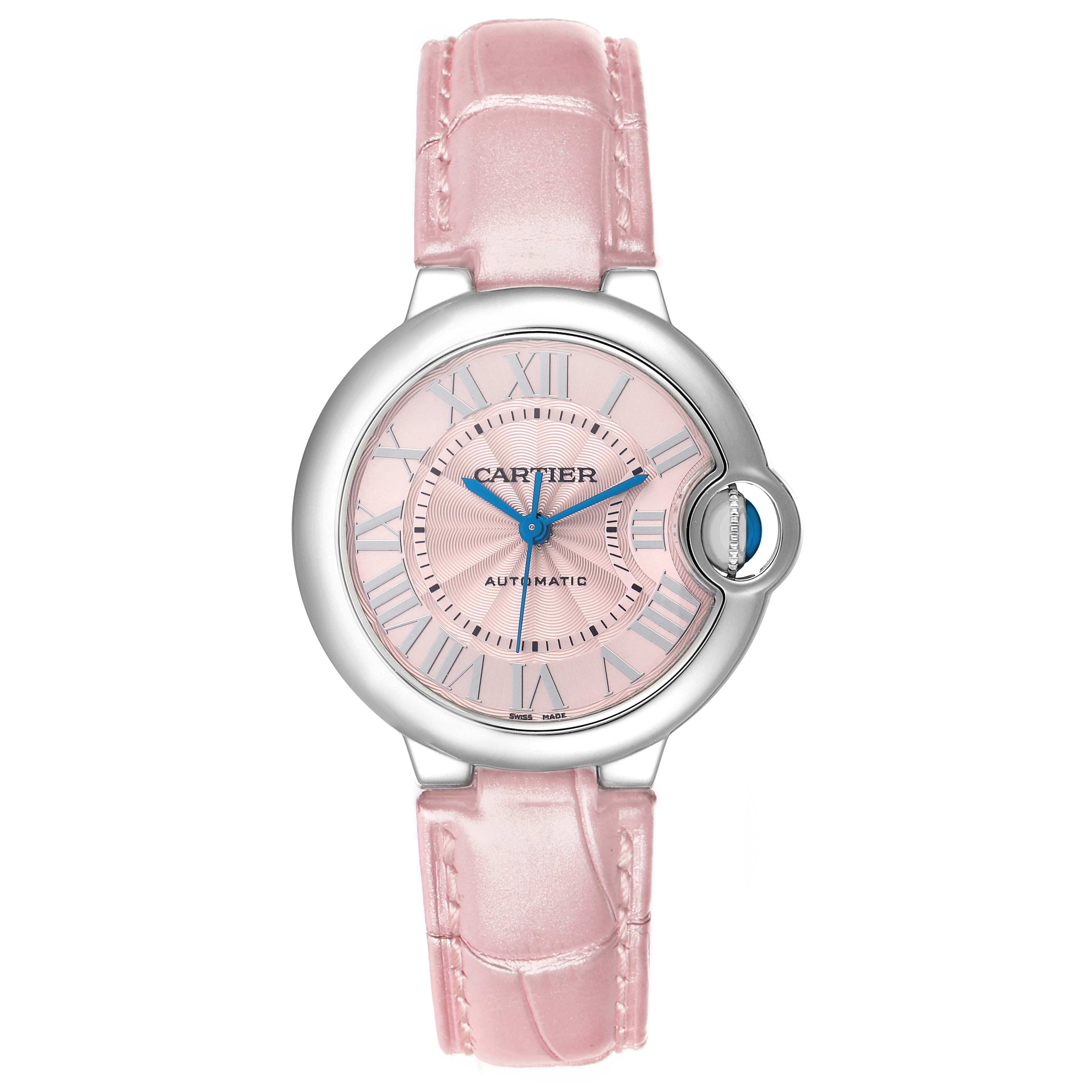 The Cartier Ballon Bleu WSBB0002 Women's Stainless Steel Pink Dial watch is shown from a front angle, displaying the pink dial, Roman numerals, and pink leather strap.