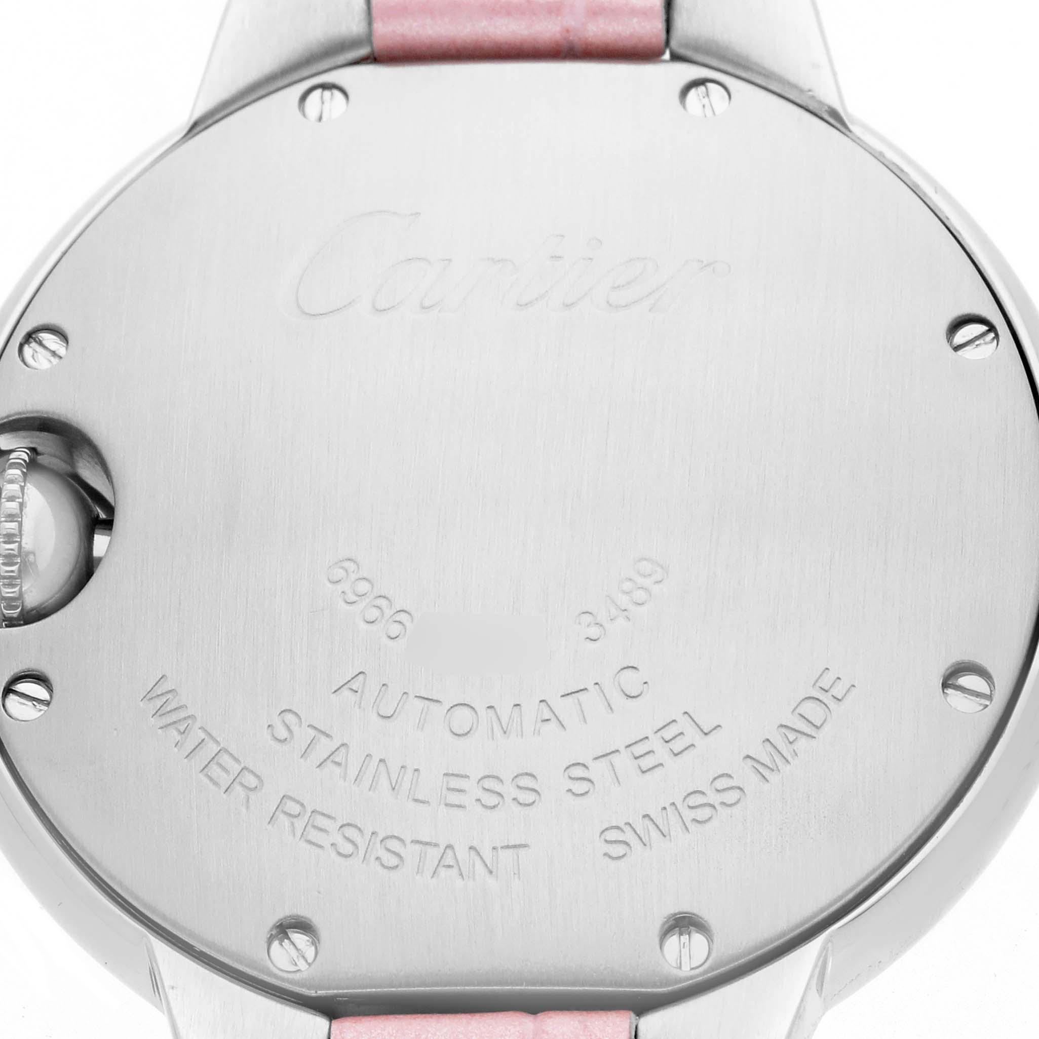 The image shows the back of a Cartier Ballon Bleu WSBB0002 Women's Stainless Steel Pink Dial watch, highlighting its stainless steel case and automatic movement.