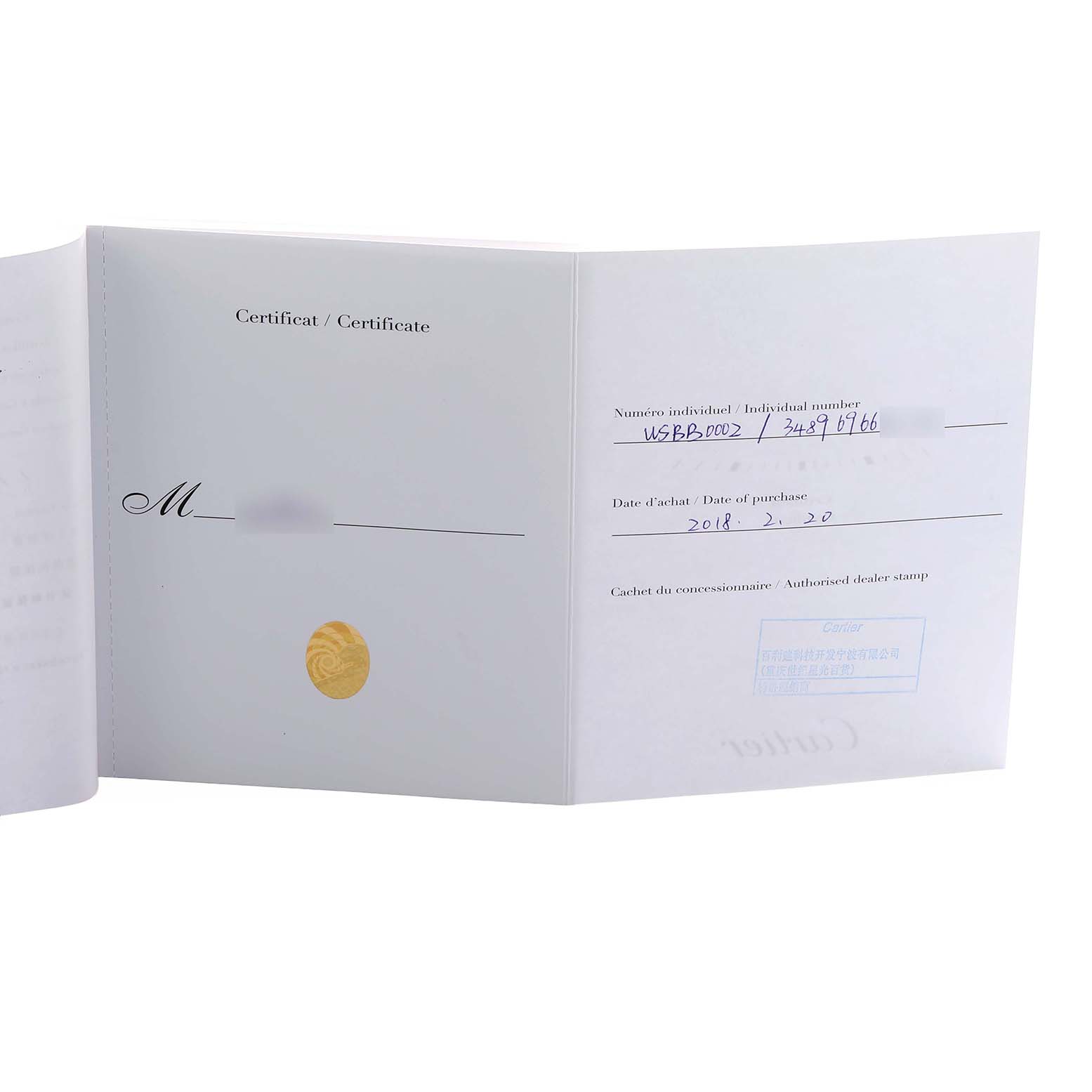 The image shows a Cartier Ballon Bleu WSBB0002 Women's Stainless Steel Pink Dial model certificate and warranty booklet, open to display purchase details and serial numbers.