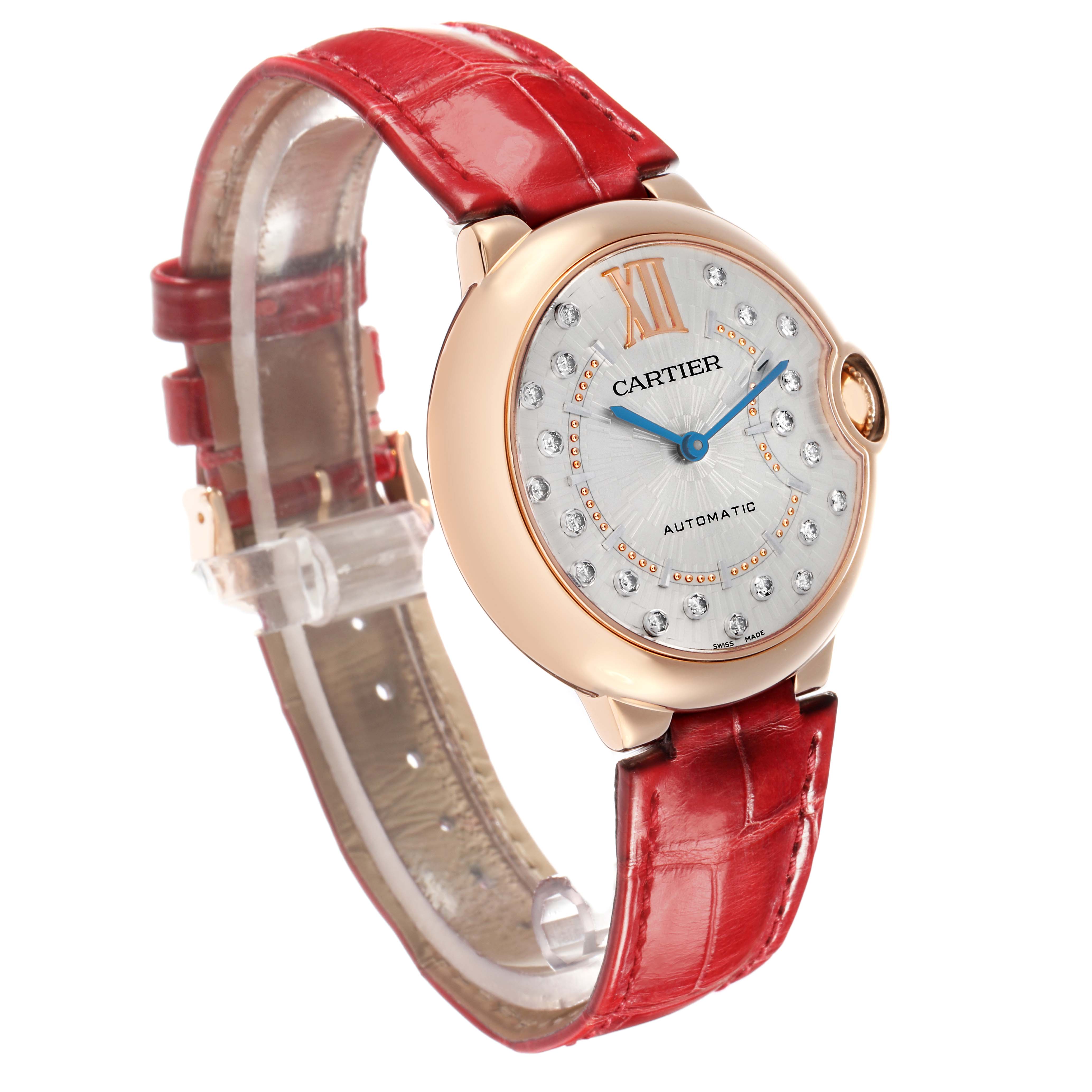 The Cartier Ballon Bleu WGBB0053 Men's Rose Gold Silver Dial watch is shown at a three-quarter angle, displaying its face, side, and red leather strap.