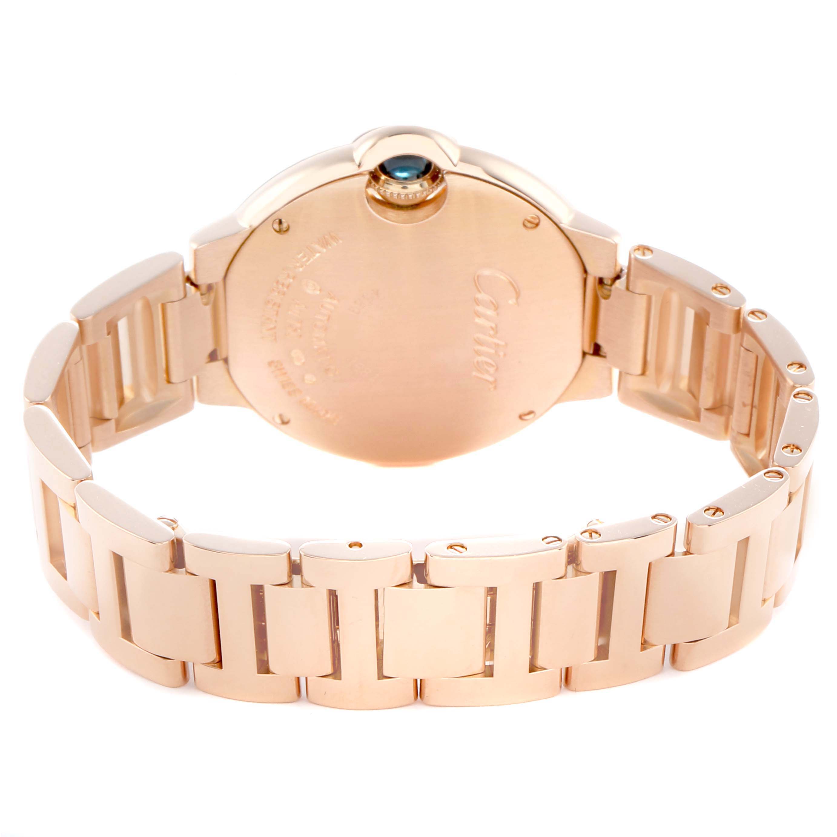 The image shows the back case and bracelet of a Cartier Ballon Bleu WJBB0036 Women's Rose Gold Silver Dial watch from a rear angle.