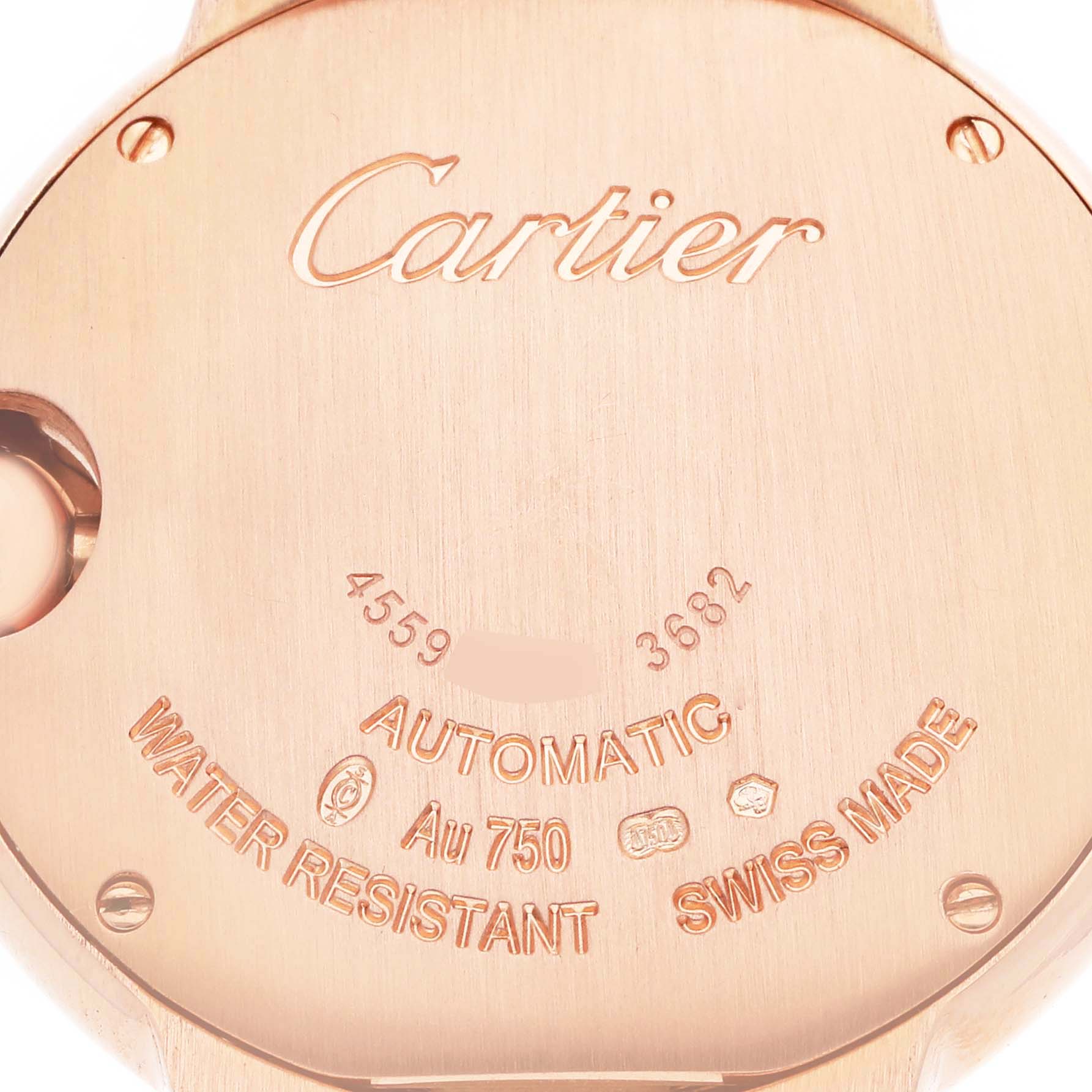 The image shows the case back of the Cartier Ballon Bleu WJBB0036 Women's Rose Gold Silver Dial watch, highlighting engravings and details like "AUTOMATIC" and "SWISS MADE."