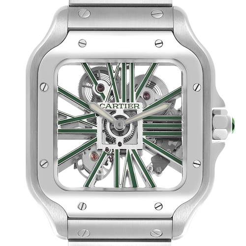 The Cartier Santos watch is shown from the front, highlighting the open-worked dial and mechanical movement.