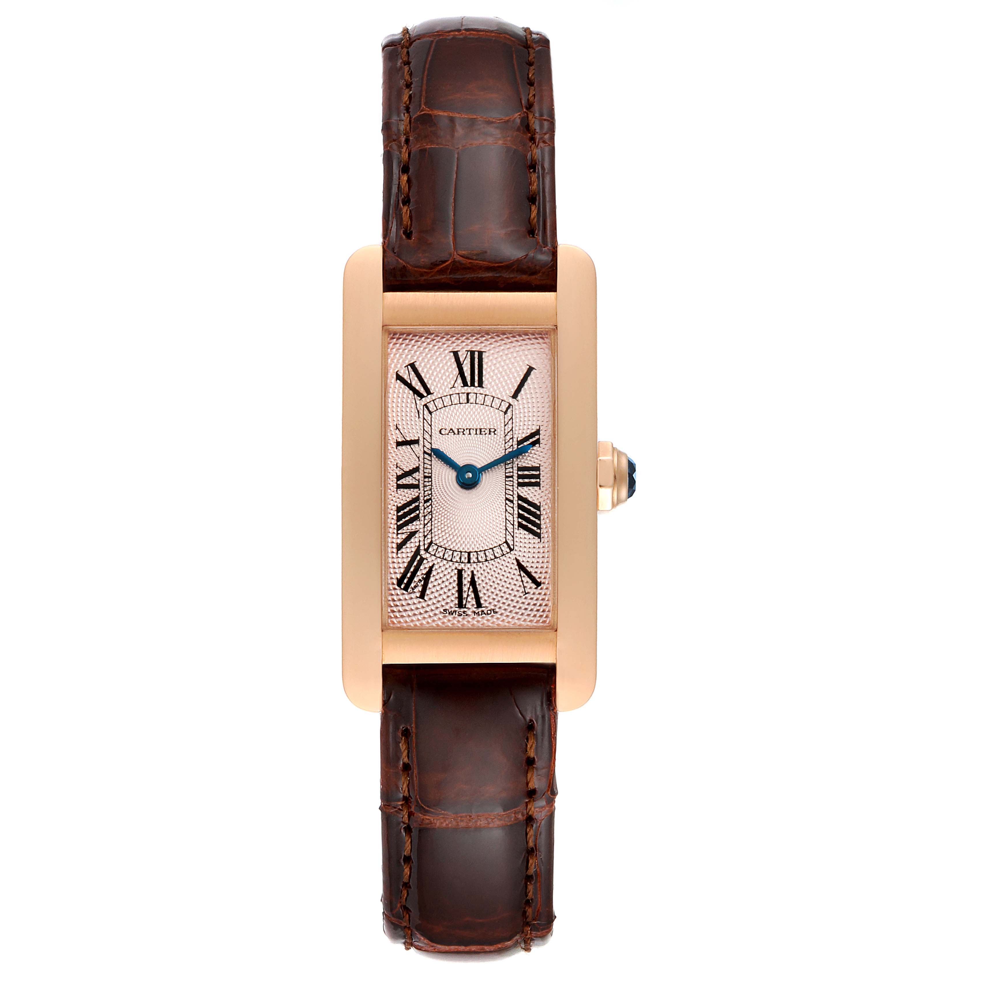The Cartier Tank Americaine 2597 Women's Rose Gold Pink Dial 2597 Women's Rose Gold Pink Dial watch is shown from the front, displaying its rectangular face, Roman numerals, and brown leather strap.