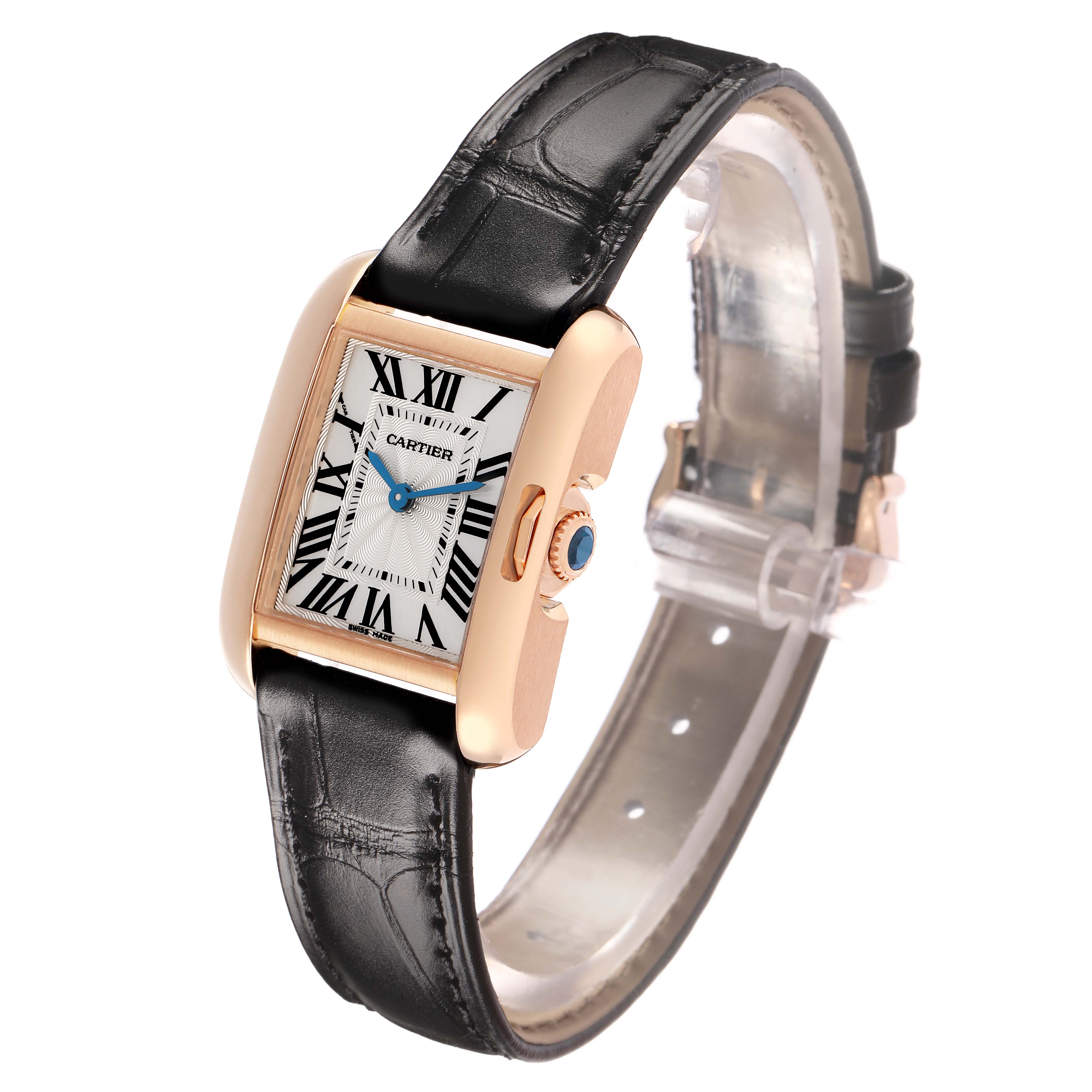 The Cartier Tank Anglaise W5310027 Women's Rose Gold Silver Dial watch is shown at a tilted angle, revealing the face, crown, and leather strap.