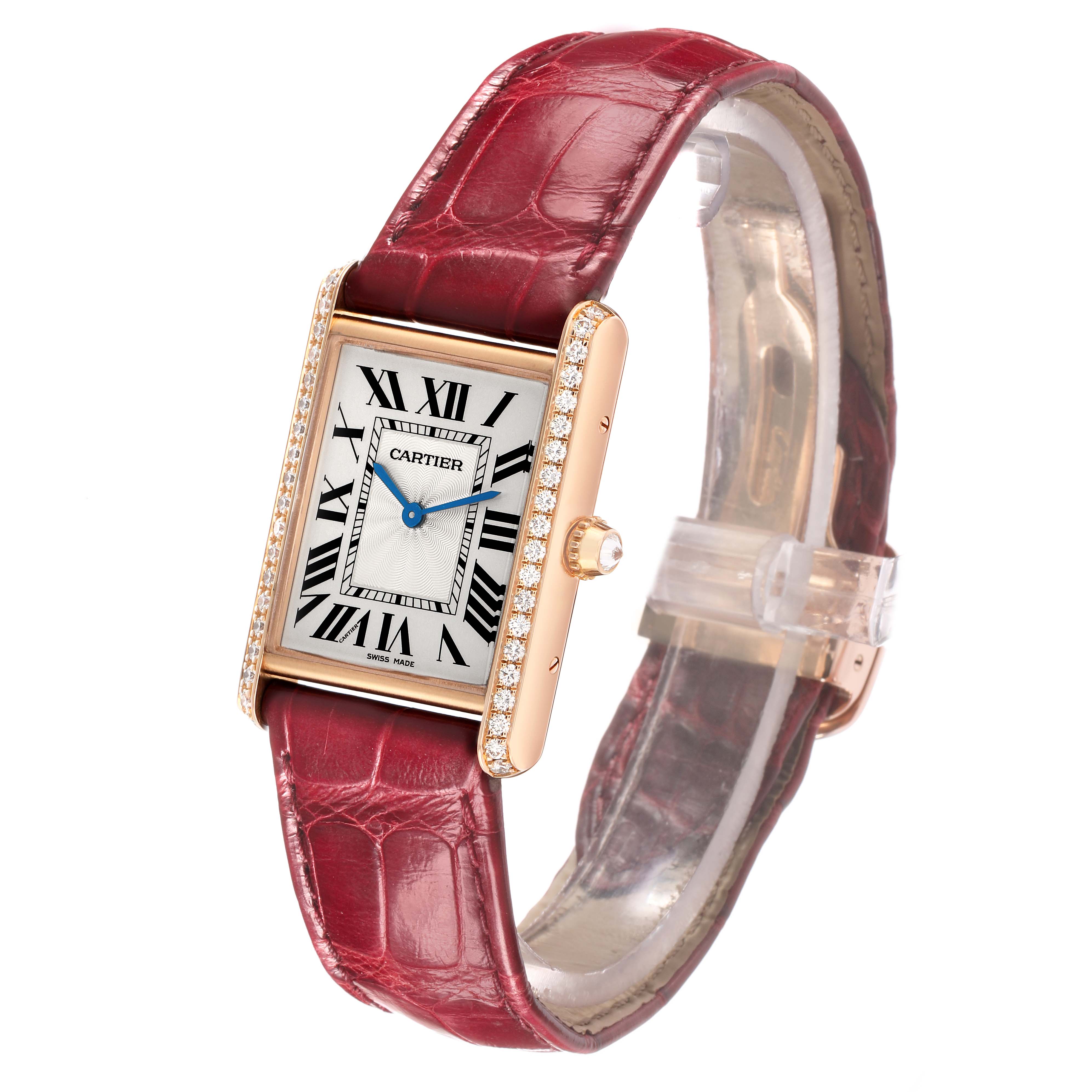 The Cartier Tank Louis WJTA0014 Women's Rose Gold Silver Dial watch is shown at an angle highlighting the dial, diamond-set bezel, and red leather strap.