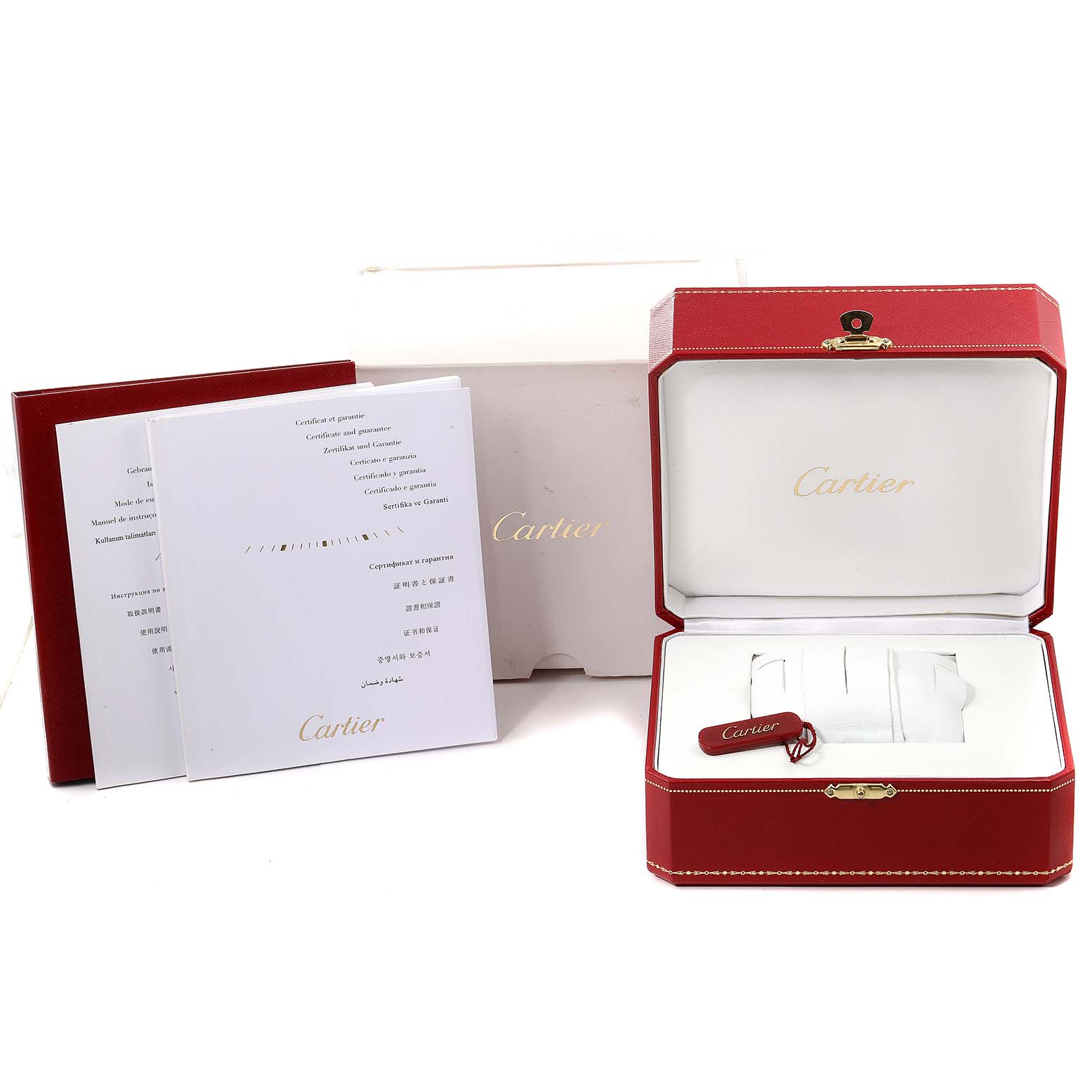 The image shows the packaging, documentation, and empty presentation box for a Cartier Tank MC W5330004 Men's Stainless Steel Black Dial W5330004 Men's Stainless Steel Black Dial watch.