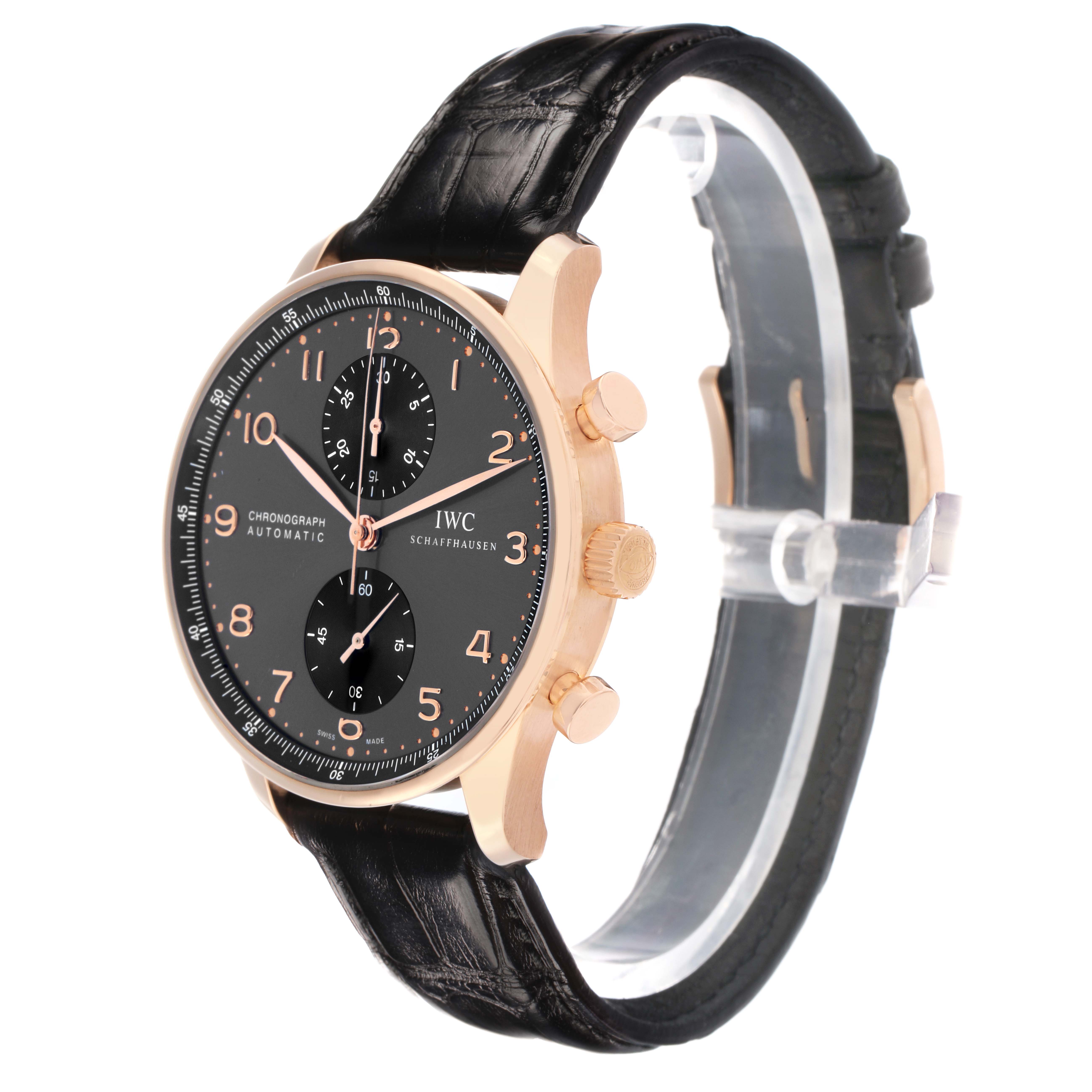 The IWC Portuguese IW371482 Men
s Rose Gold Grey Dial watch is shown at a slight side angle, highlighting the dial, crown, pushers, and leather strap.