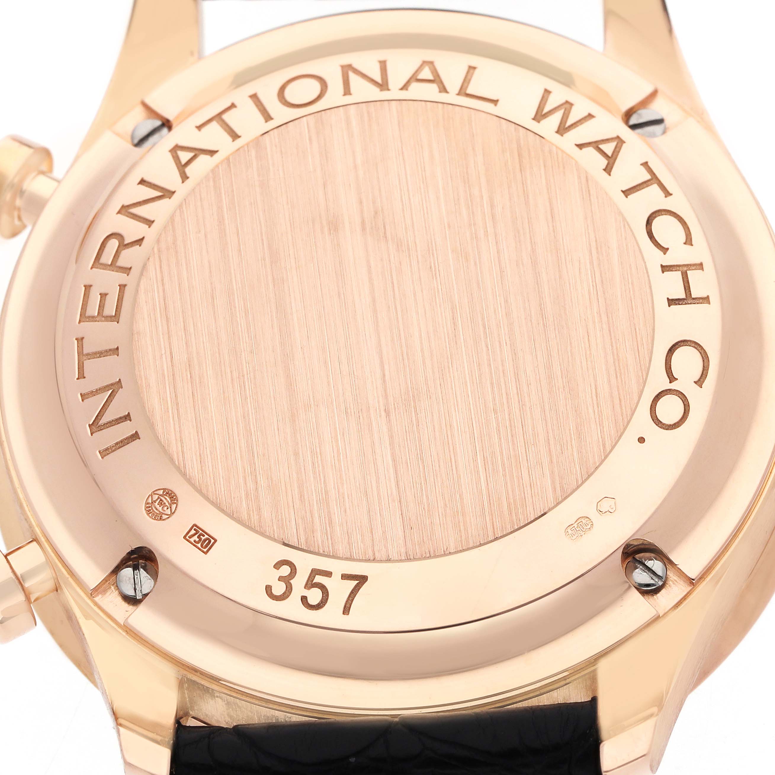 The IWC Portuguese IW371482 Men
s Rose Gold Grey Dial watch is shown from the back angle, highlighting its case back and part of the strap.