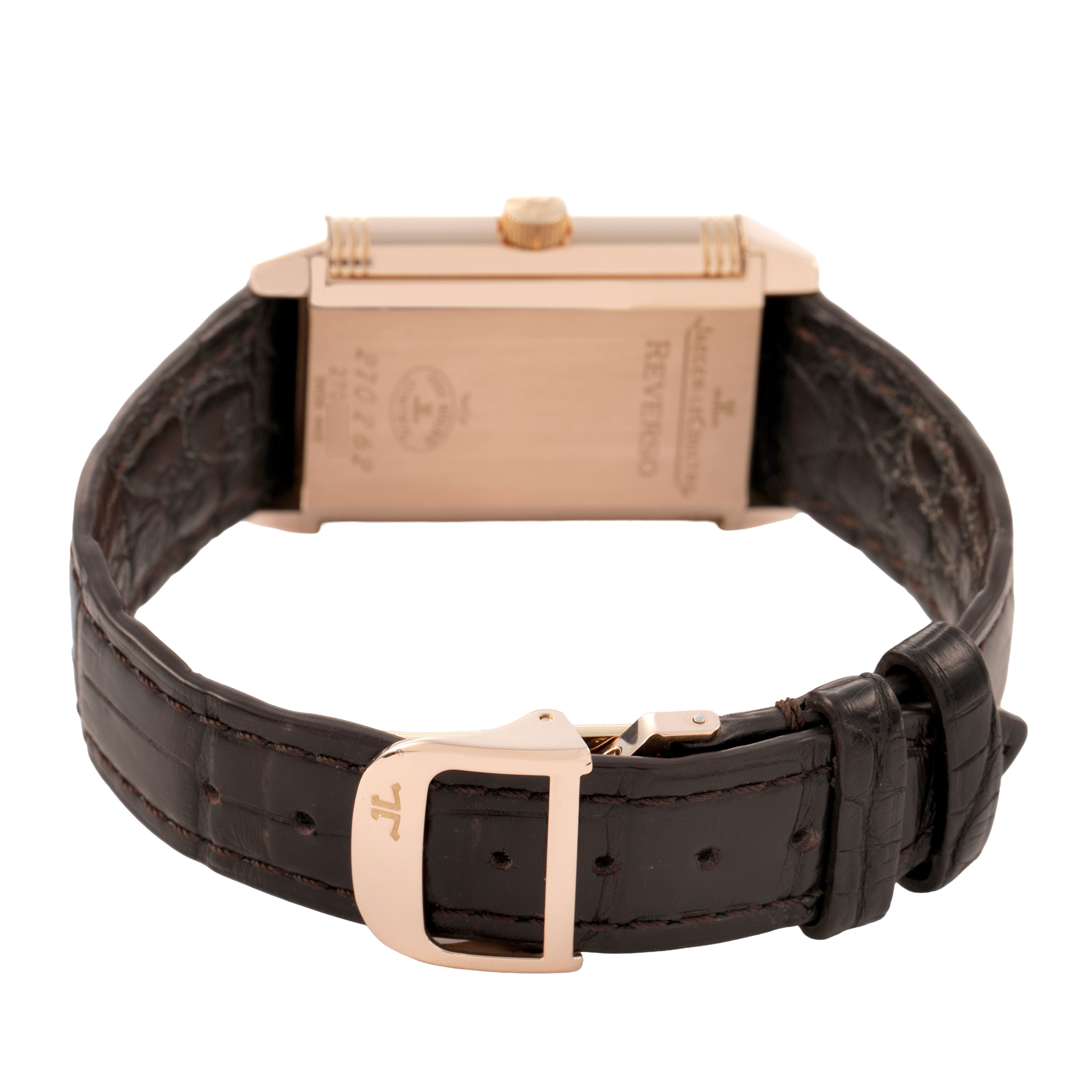 The Jaeger LeCoultre Reverso 270.2.62 / Q2702421 Men's Rose Gold Silver Dial watch is shown from the back, highlighting the case, crown, and leather strap with a clasp.