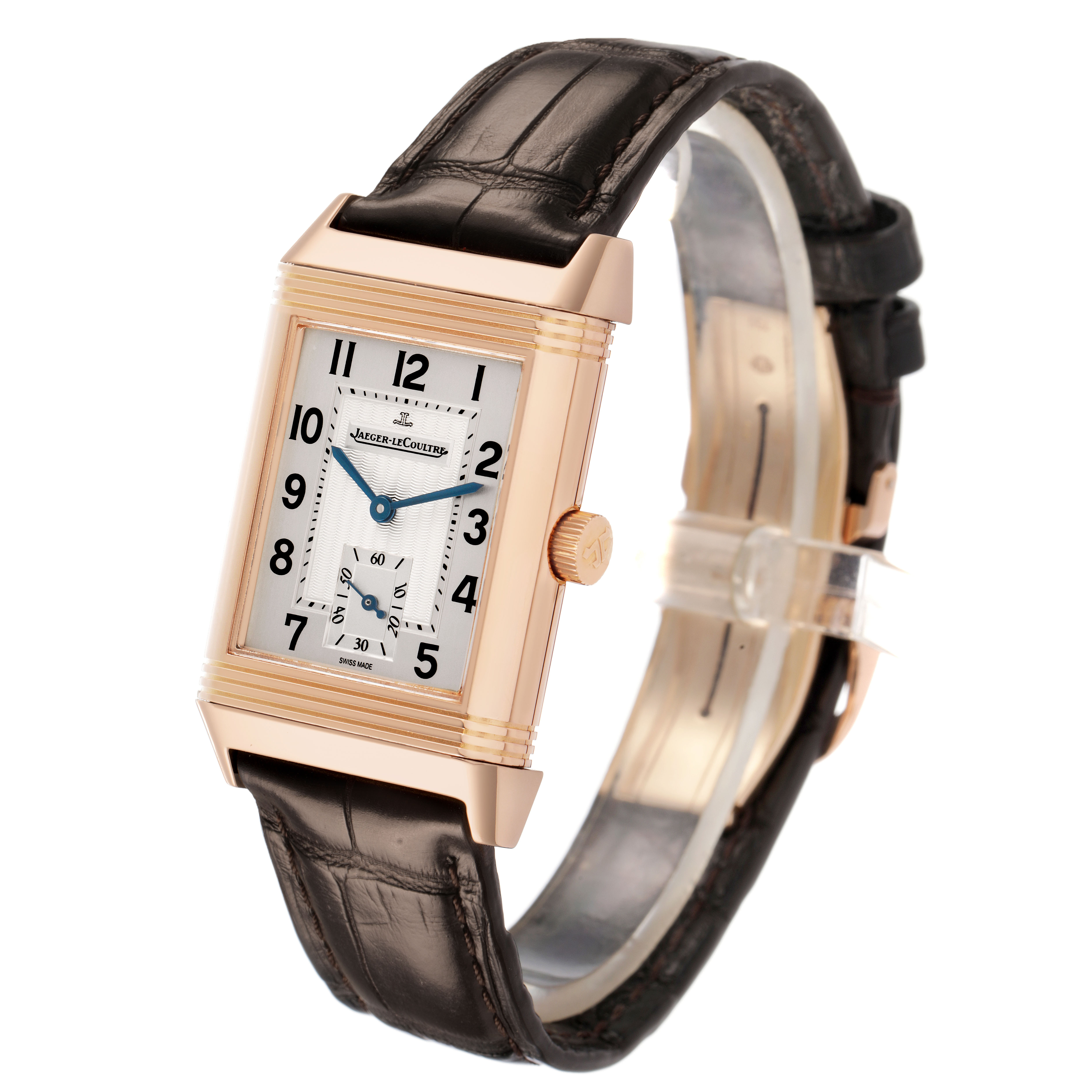 The Jaeger-LeCoultre Reverso watch is shown at a slight angle, highlighting the front face, crown, and leather strap.