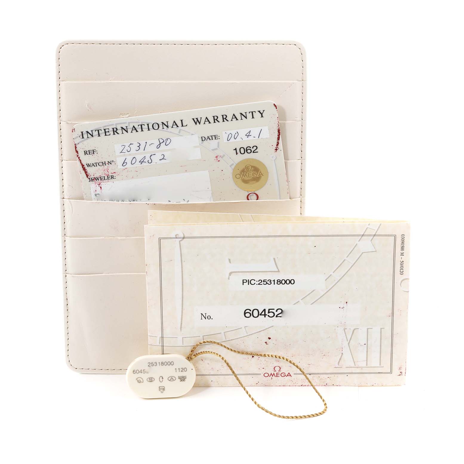 The image shows the warranty card, manual, and serial tag for the Omega Seamaster 2531.80.00 Men's Stainless Steel Blue Dial 2531.80.00 Men's Stainless Steel Blue Dial watch model 2531.80.