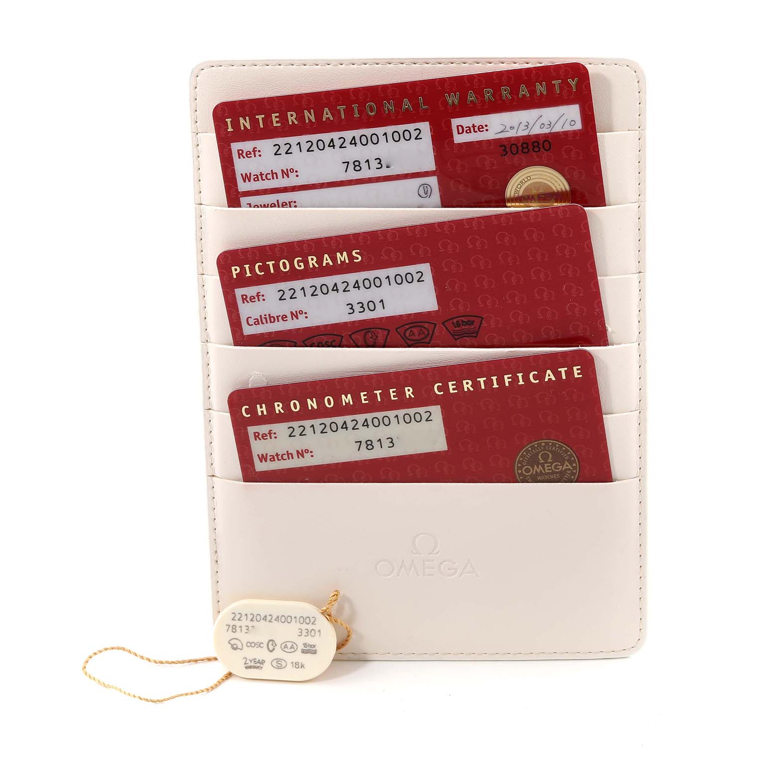 This image shows the warranty cards for an Omega Aqua Terra 221.20.42.40.01.002 Men's Rose Gold Black Dial 221.20.42.40.01.002 Men's Rose Gold Black Dial model, displayed in a cream-colored cardholder.