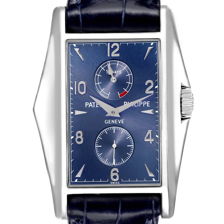 The Patek Philippe Gondolo watch is shown from a front angle, highlighting the blue dial, subdials, and silver case details.