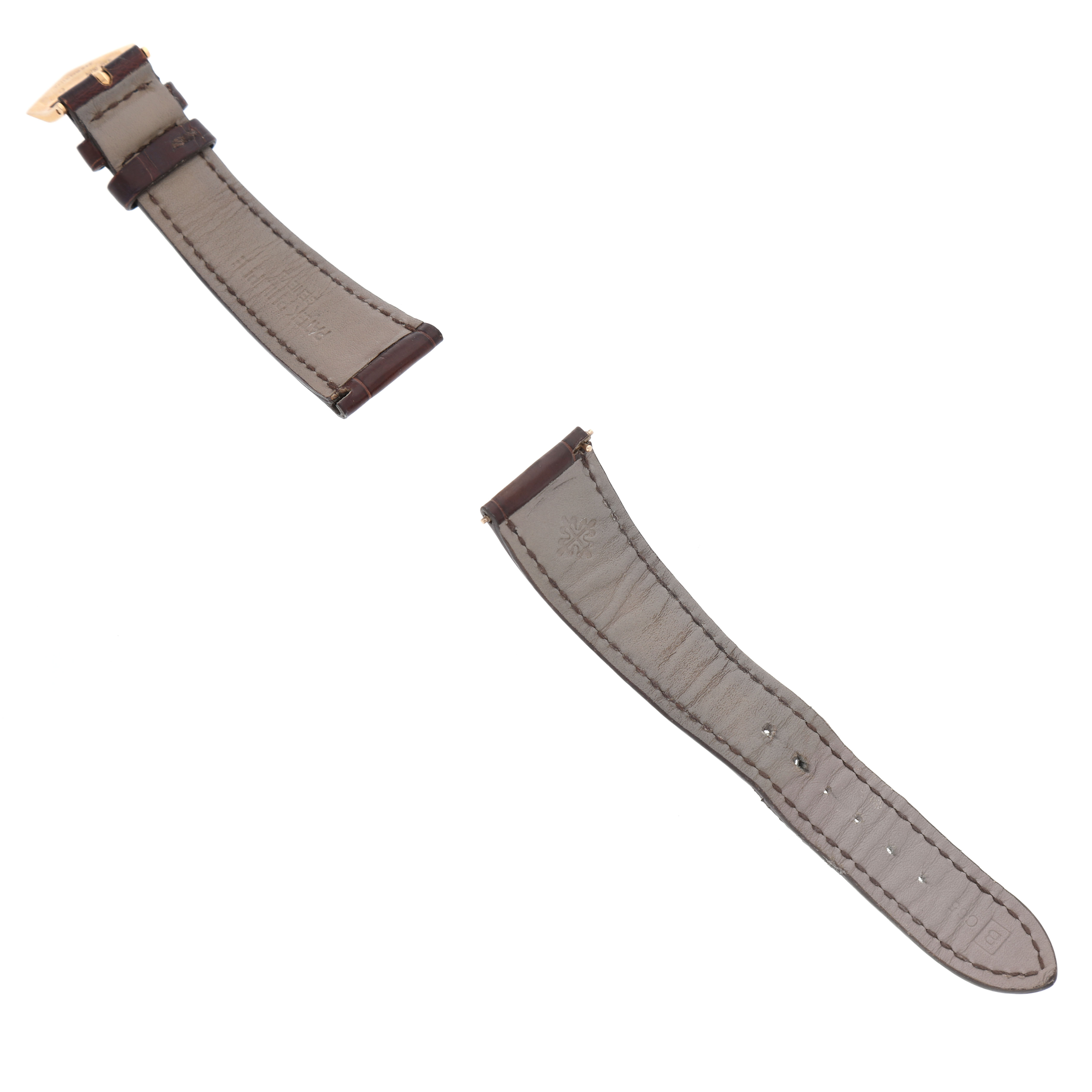 The image shows two detached leather straps for a Patek Philippe Calatrava 5196R-001 Men's Rose Gold Silver Dial watch, displayed with the underside visible.