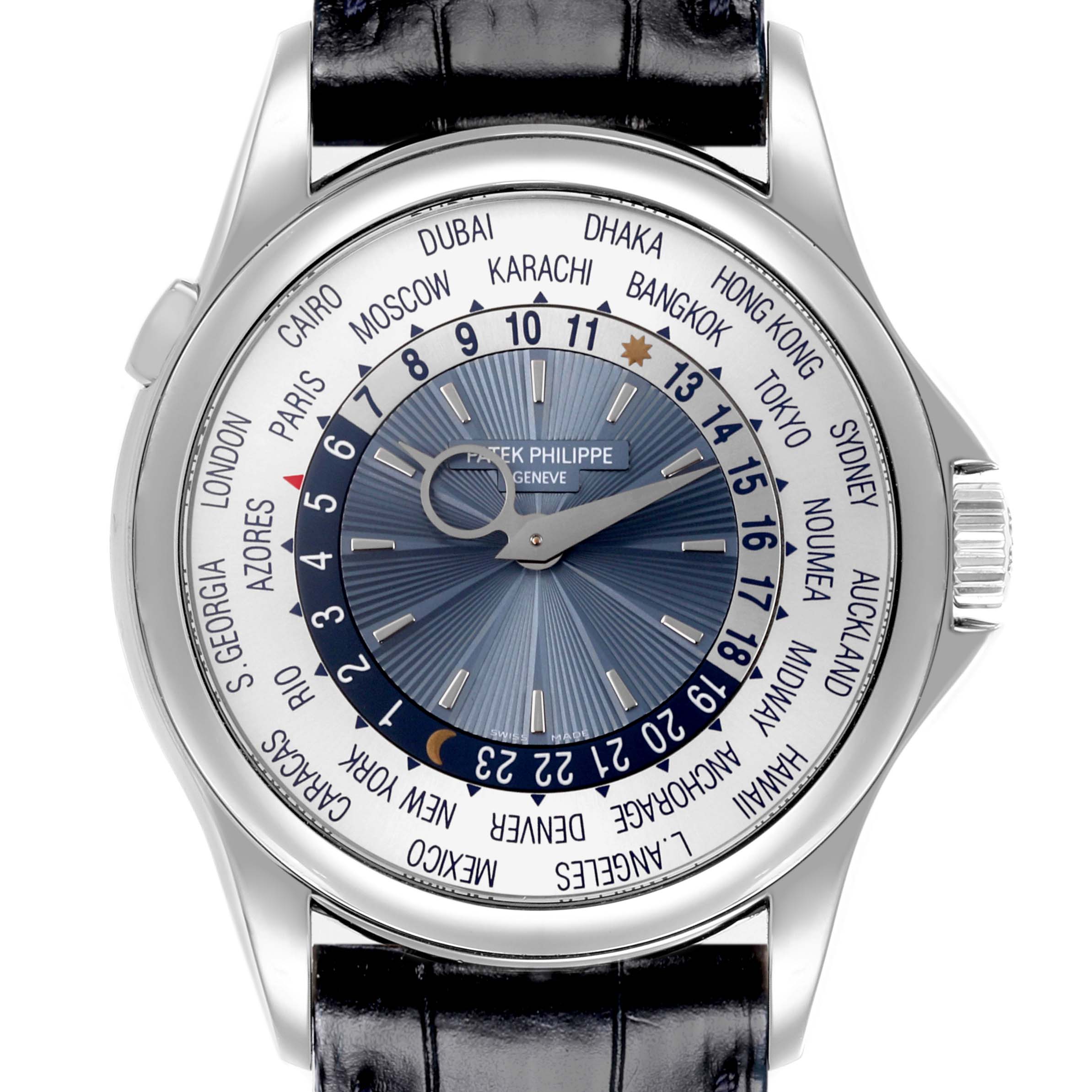 The Patek Philippe Complications 5130P-001 Men's Platinum Blue Dial 5130P-001 Men's Platinum Blue Dial watch is shown from the front, displaying its face and bezel with city names.