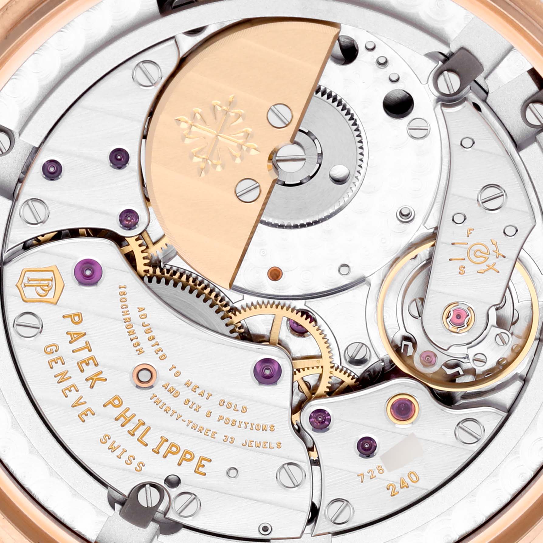 This image shows the intricate movement and rotor of a Patek Philippe Complications 5230R-012 Men's Rose Gold Grey Dial 5230R-012 Men's Rose Gold Grey Dial model watch from the back.