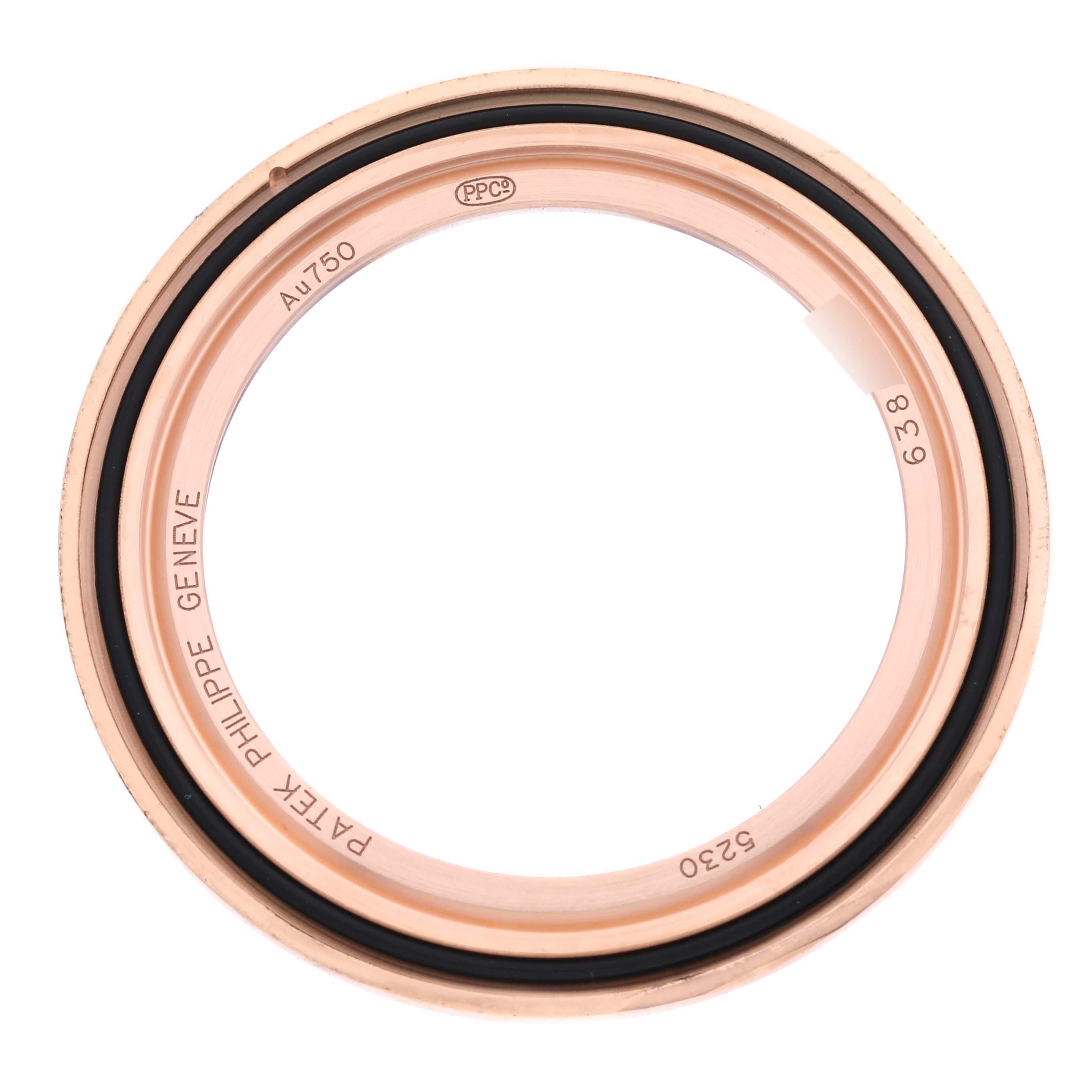 This image shows the bezel of a Patek Philippe Complications 5230R-012 Men's Rose Gold Grey Dial 5230R-012 Men's Rose Gold Grey Dial watch from a top-down angle.