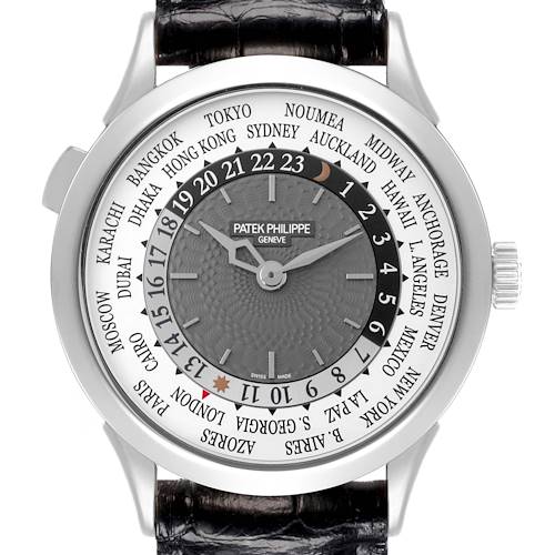 The Patek Philippe Complications watch is shown from the front, displaying the dial with world time zones and a black leather strap.