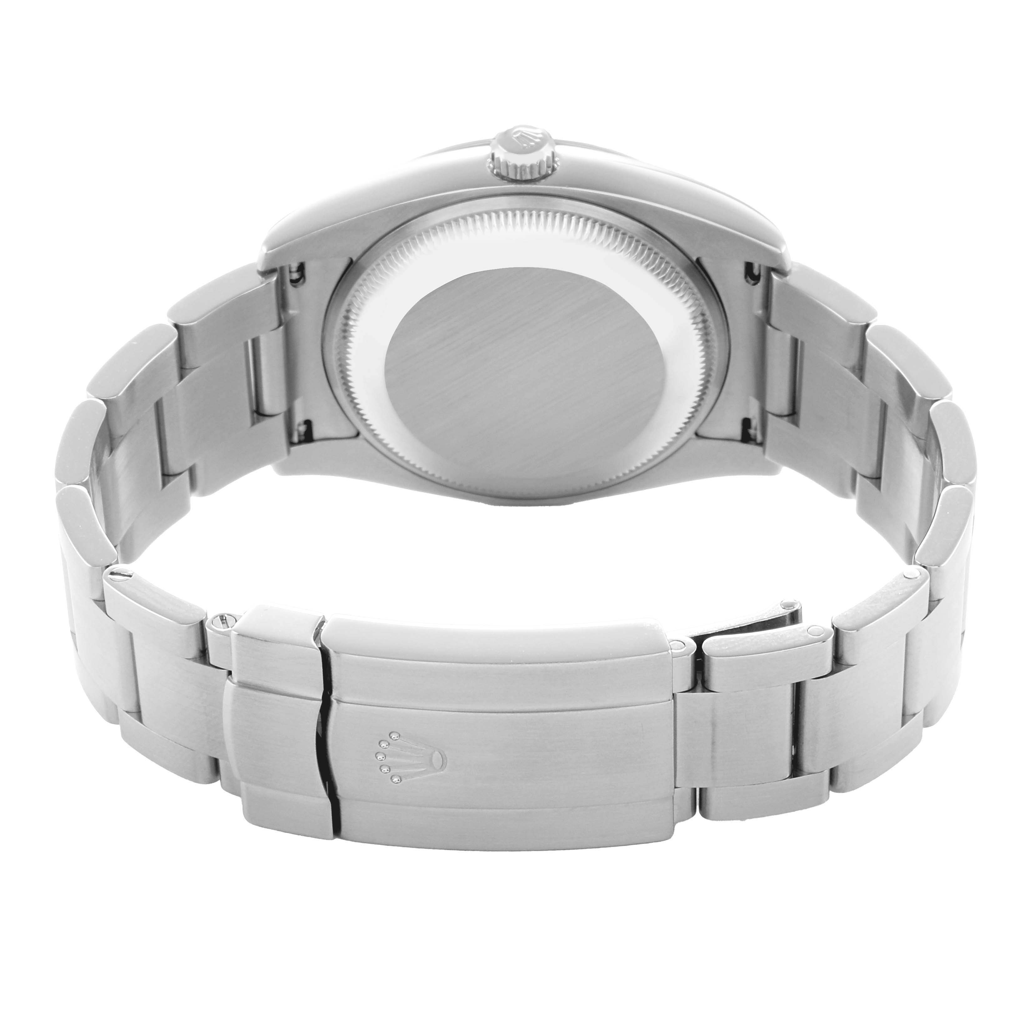 This image shows the back of the Rolex Air-King 114200 Men
s Stainless Steel Blue Dial watch, highlighting the case, crown, and bracelet clasp.