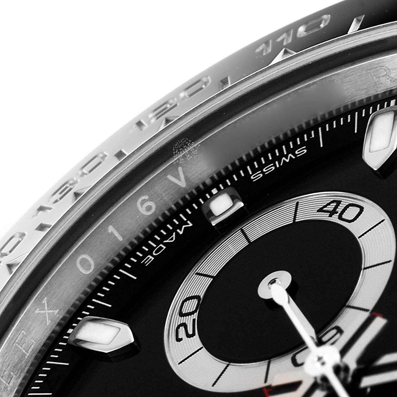 This close-up image shows the bezel and partial dial of the Rolex Daytona 116500 Men's Stainless Steel Black Dial 116500 Men's Stainless Steel Black Dial watch.
