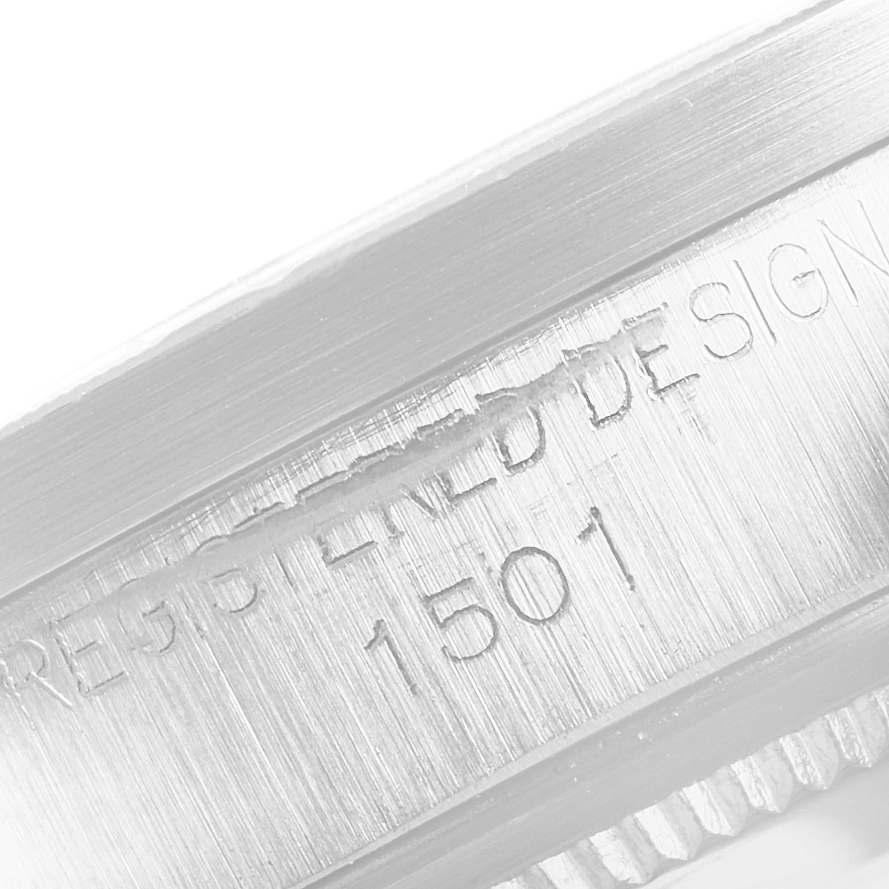 This is a close-up image of the case back edge, showing the "REGISTERED DESIGN 1501" engraving on a Rolex Date 1501 Men's Stainless Steel Silver Dial 1501 Men's Stainless Steel Silver Dial model watch.