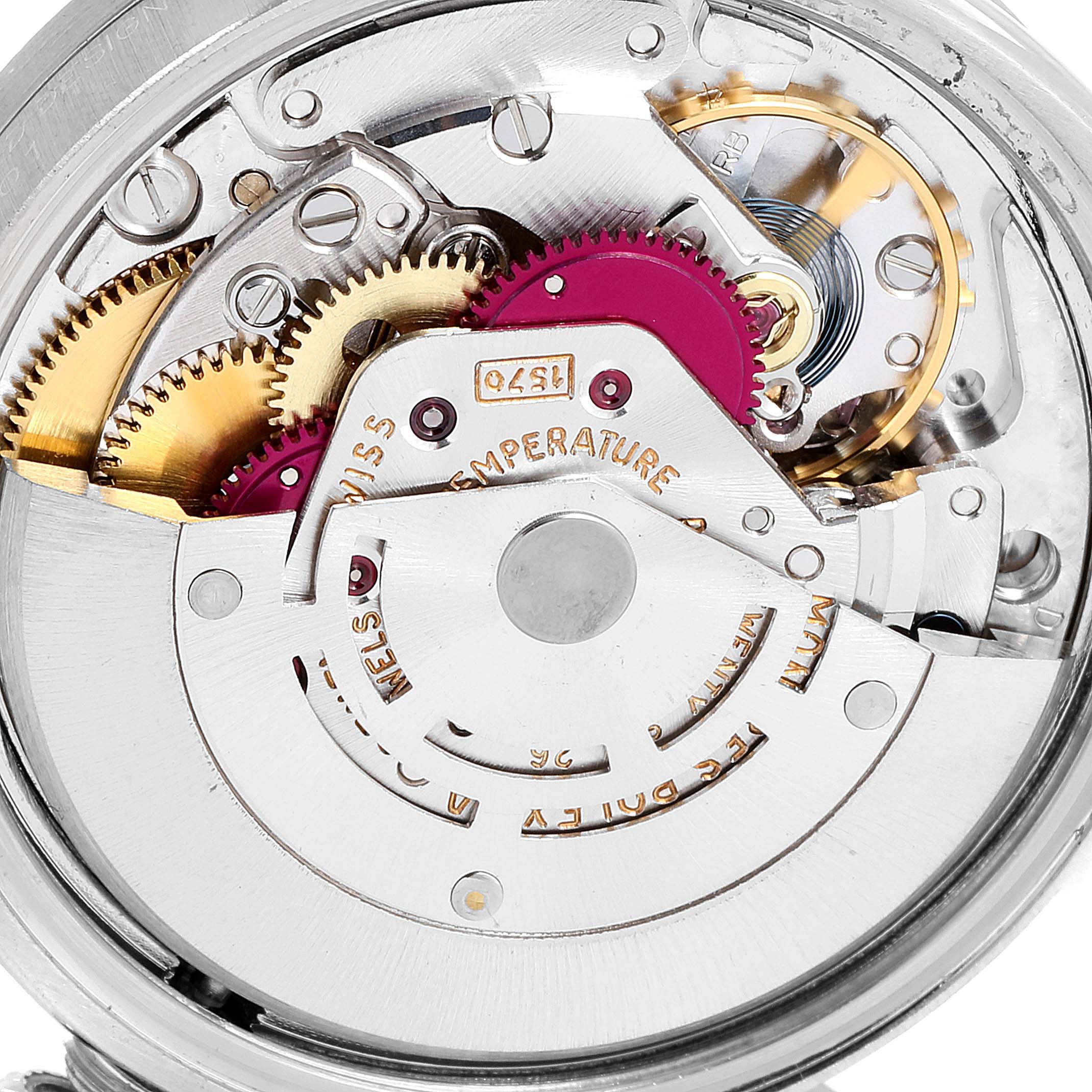 This image shows a close-up view of the inner mechanical components of a Rolex Date 1501 Men's Stainless Steel Silver Dial 1501 Men's Stainless Steel Silver Dial model watch.