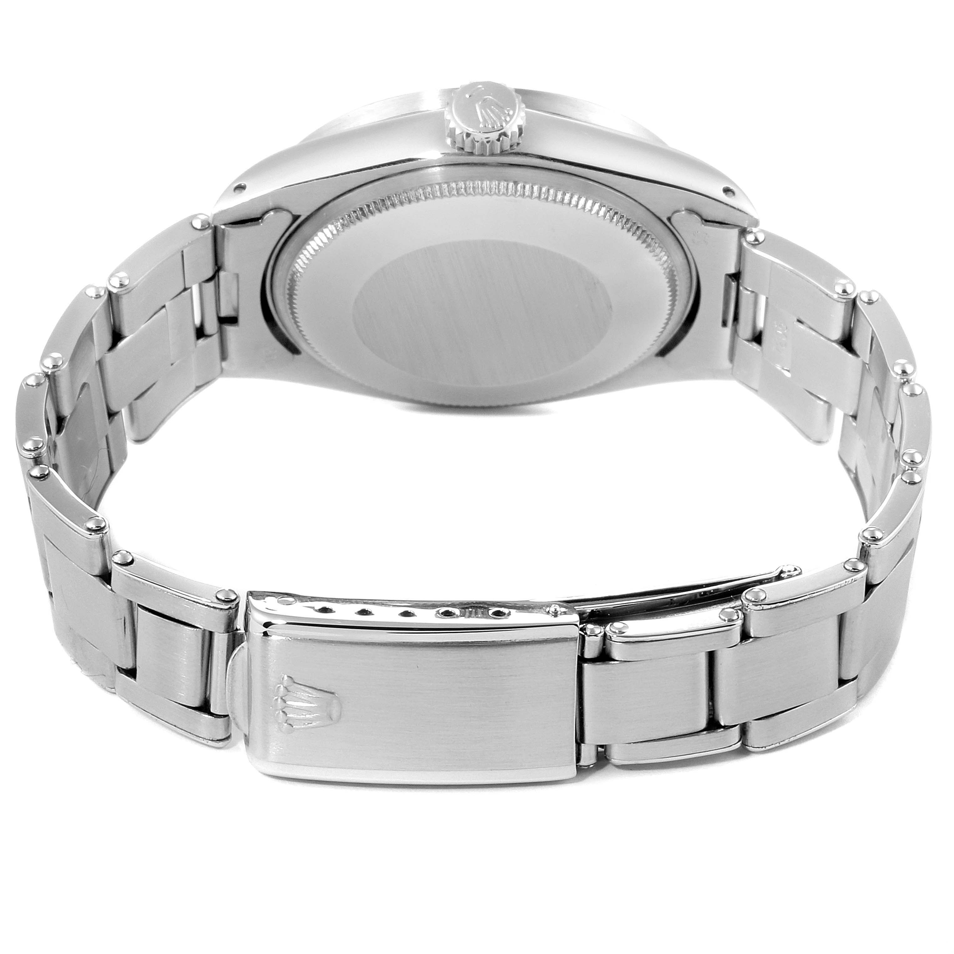 The image shows the back view of a Rolex Date 1501 Men's Stainless Steel Silver Dial 1501 Men's Stainless Steel Silver Dial model watch, highlighting the bracelet and clasp.
