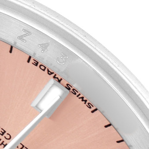 The image shows a close-up of the dial and bezel edge of a Rolex Datejust 179160 Women's Stainless Steel Pink Dial, highlighting the "Swiss Made" text.