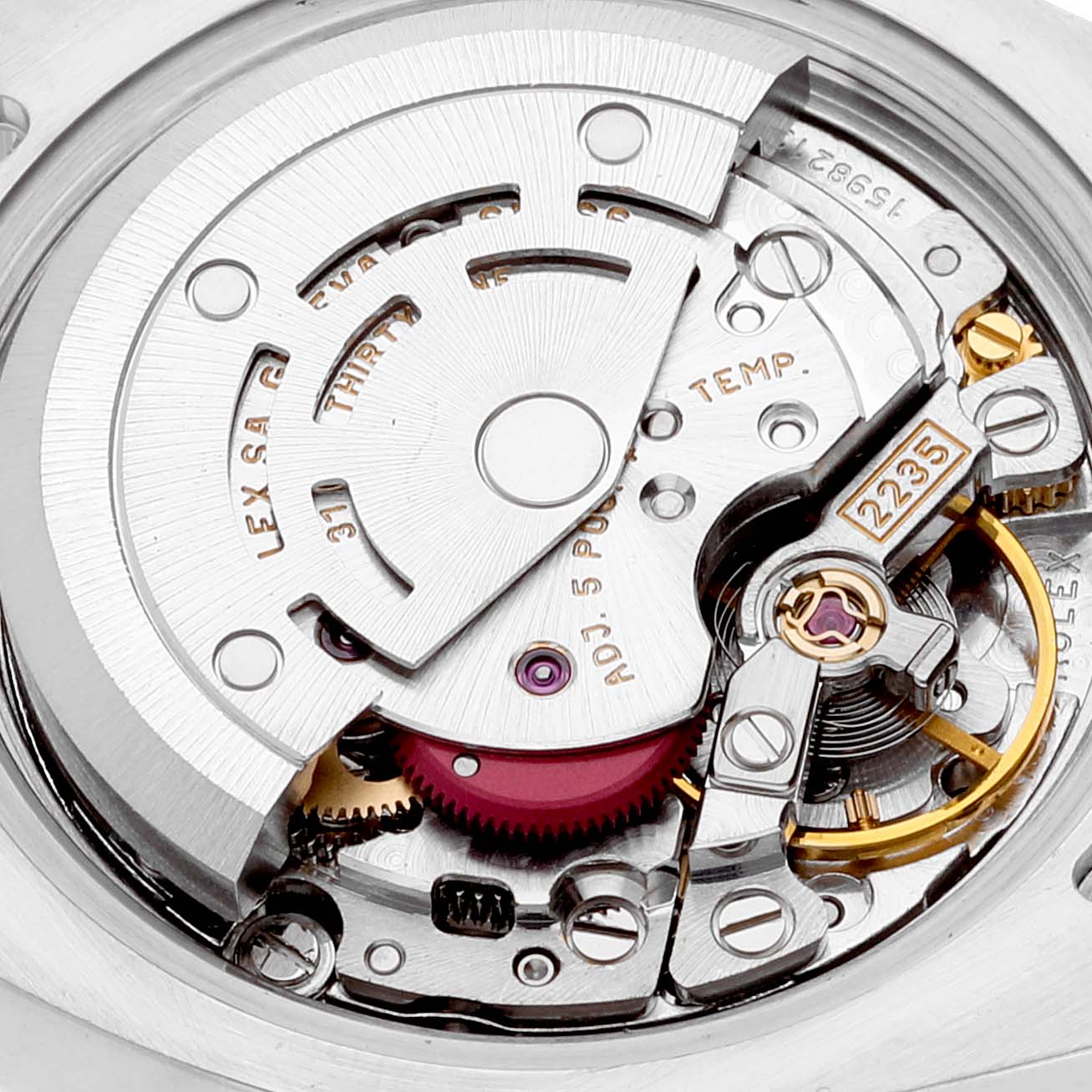 This is a close-up view of the movement inside the Rolex Datejust 179173 Women's Steel and Gold (two tone) Silver Dial 179173 Women's Steel and Gold (two tone) Silver Dial, showcasing its intricate mechanical parts.