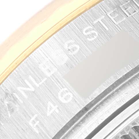 The image shows a close-up of the back casing of a Rolex Datejust 179173 Women's Steel and Gold (two tone) Silver Dial 179173 Women's Steel and Gold (two tone) Silver Dial watch, highlighting the stainless steel part of the casing.