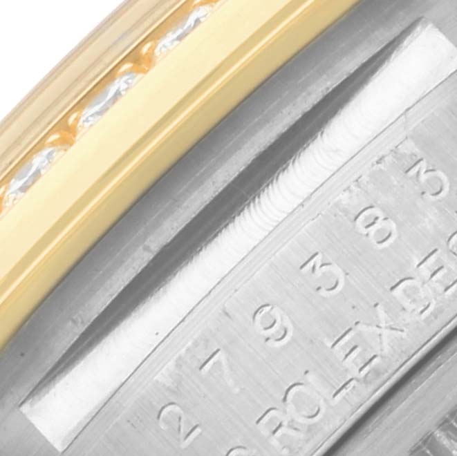 The image shows a close-up of the Rolex Datejust 279383RBR Women's Steel and Gold (two tone) Mother of Pearl Dial 279383RBR Women's Steel and Gold (two tone) Mother of Pearl Dial model's bezel and engraved inner ring.