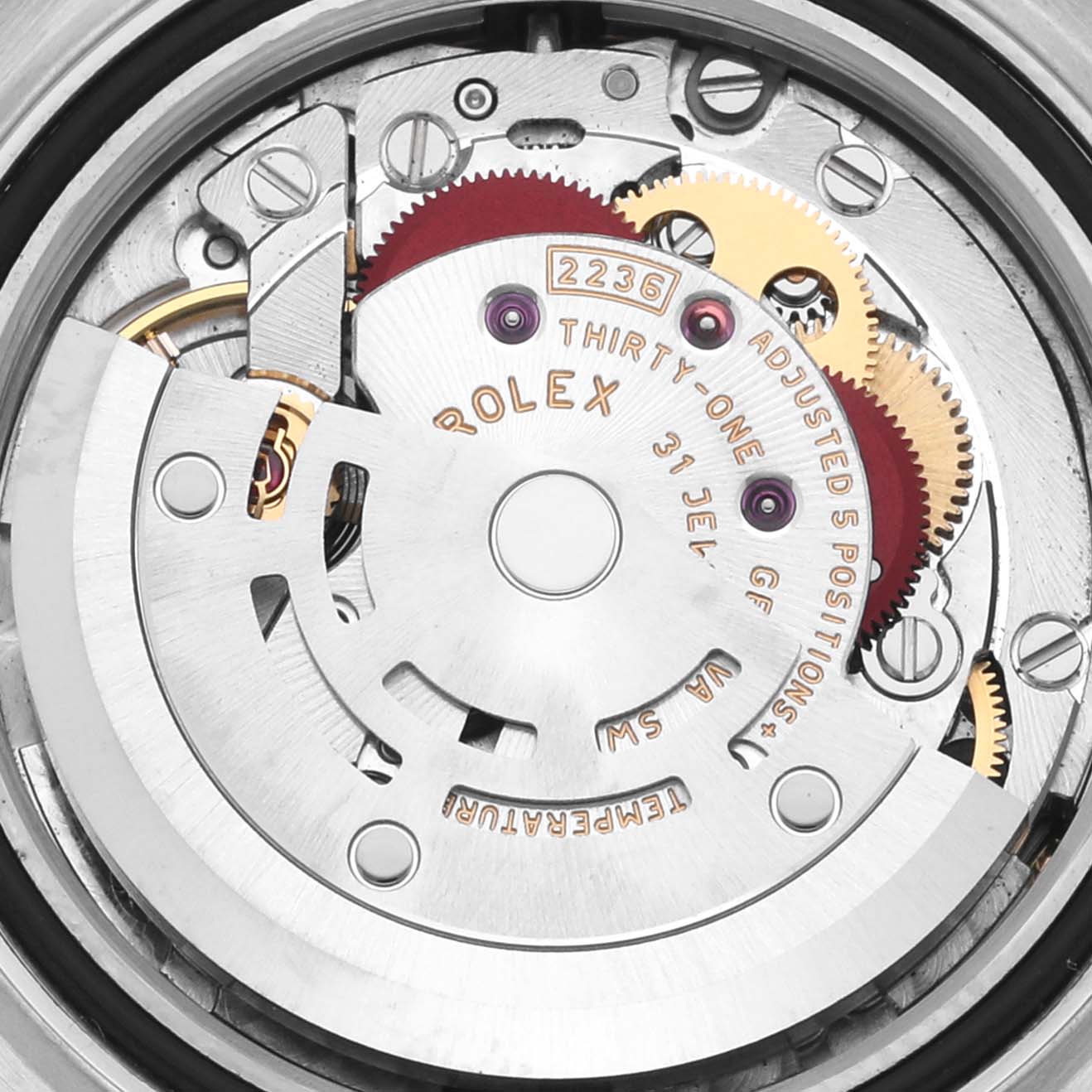 The image shows the intricate movement mechanism of a Rolex Datejust 279383RBR Women's Steel and Gold (two tone) Mother of Pearl Dial 279383RBR Women's Steel and Gold (two tone) Mother of Pearl Dial watch from a top-down angle.