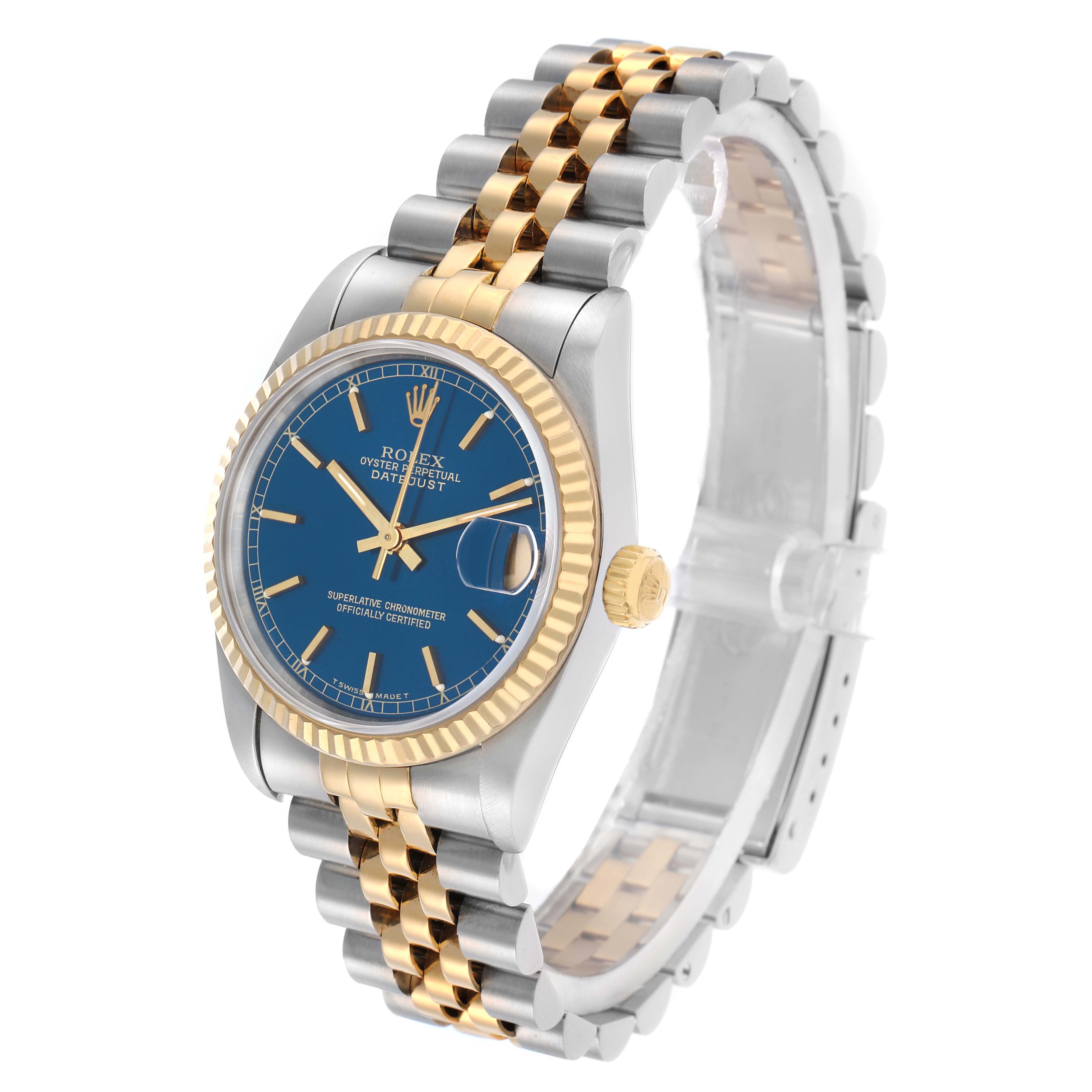 The Rolex Mid-Size 68273 Women
s Steel and Gold (two tone) Blue Dial model is shown at a slight angle, displaying the face, bezel, crown, and part of the bracelet.