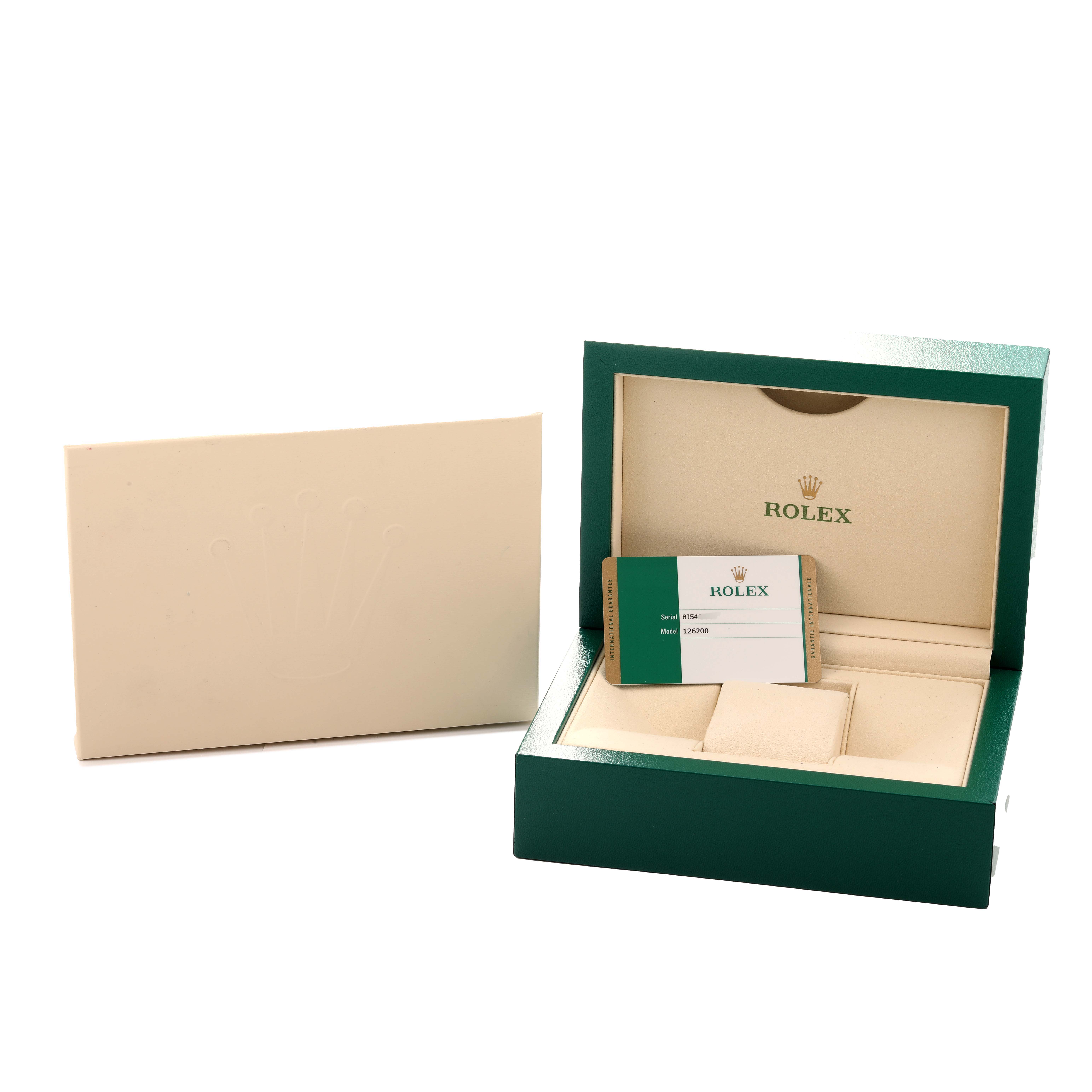 The image shows the open box and Best Quality
ity card for a Rolex Datejust 126200 Men
s Stainless Steel Black Dial watch.