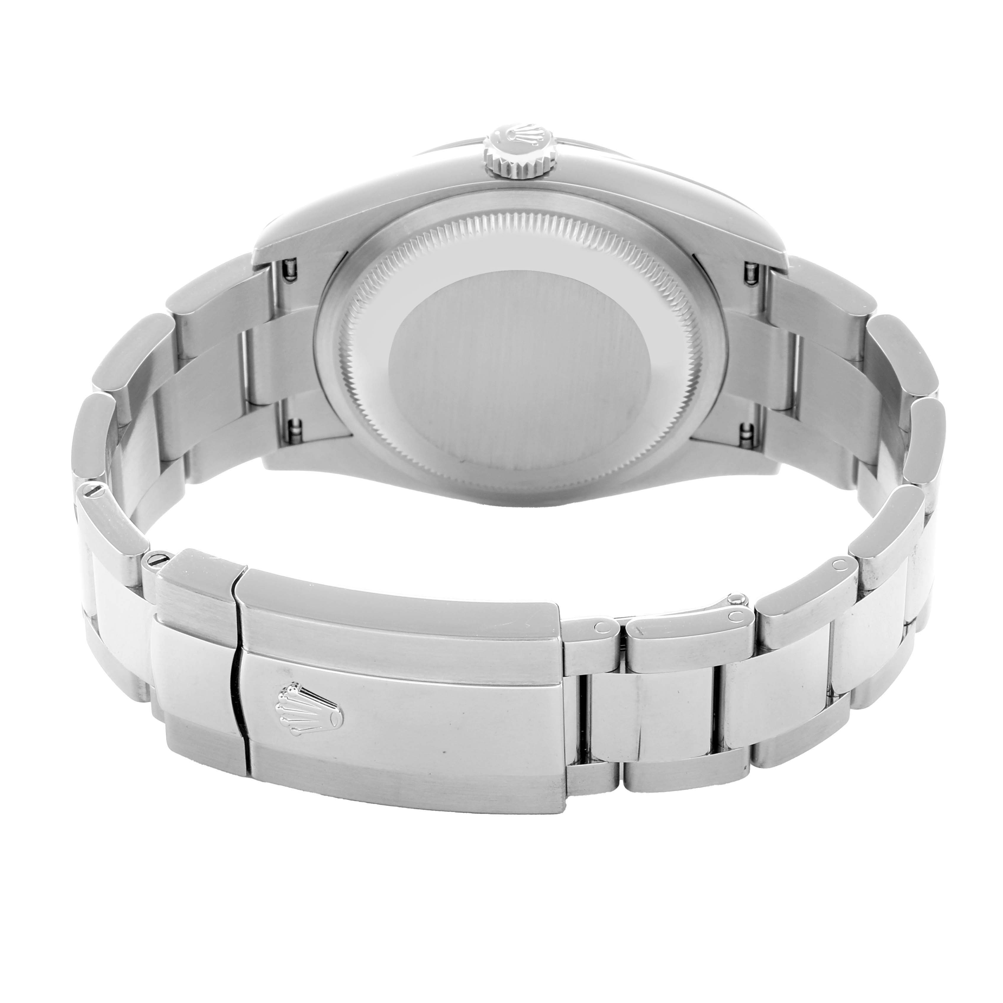 The image shows the back and clasp of a Rolex Datejust 126200 Men
s Stainless Steel Black Dial watch at a rear angle.