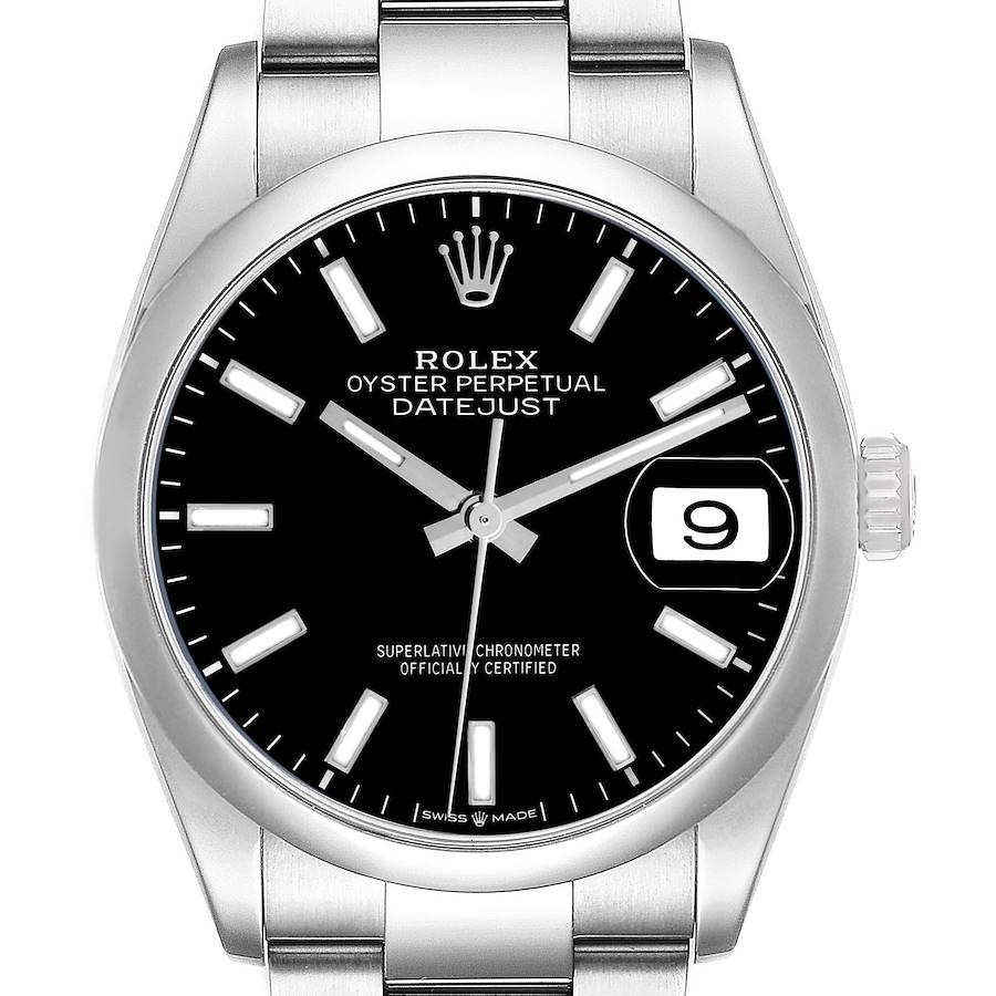 The image shows a frontal view of a Rolex Datejust 126200 Men's Stainless Steel Black Dial watch, highlighting the black dial, hour markers, and date window.