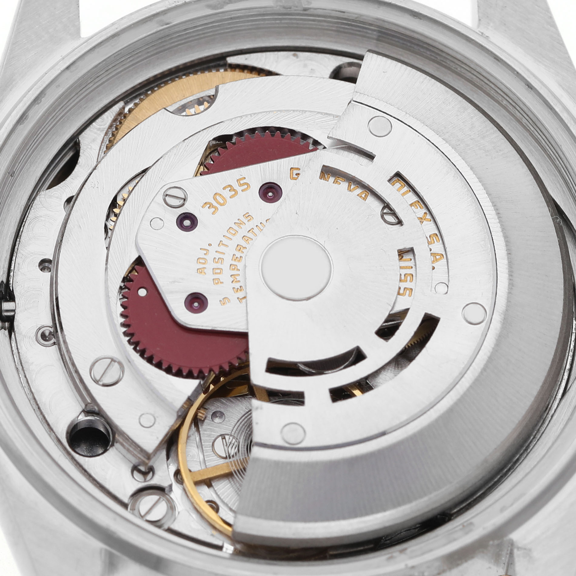 The image shows the movement of a Rolex Datejust 16013 Men's Steel and Gold (two tone) Champagne Dial from a top-down angle, highlighting the rotor and gear components.