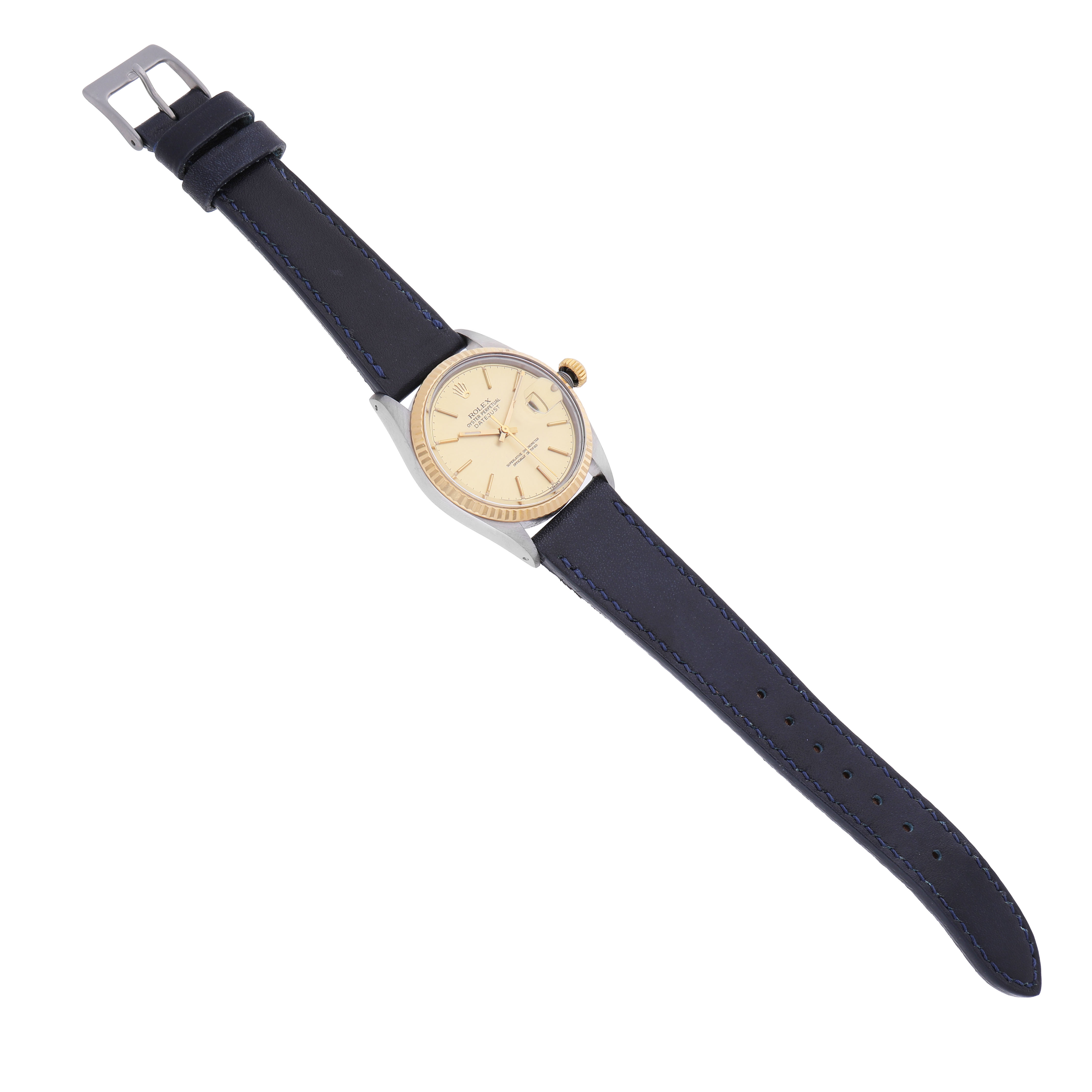 The Rolex Datejust 16013 Men's Steel and Gold (two tone) Champagne Dial watch is shown from a top-down view, highlighting the dial, case, and blue leather strap.