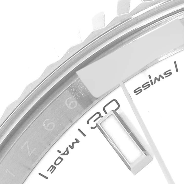 This image shows a close-up of the dial, part of the bezel, and the date window of the Rolex Datejust 41 126334 Men's Stainless Steel White Dial 126334 Men's Stainless Steel White Dial model watch.