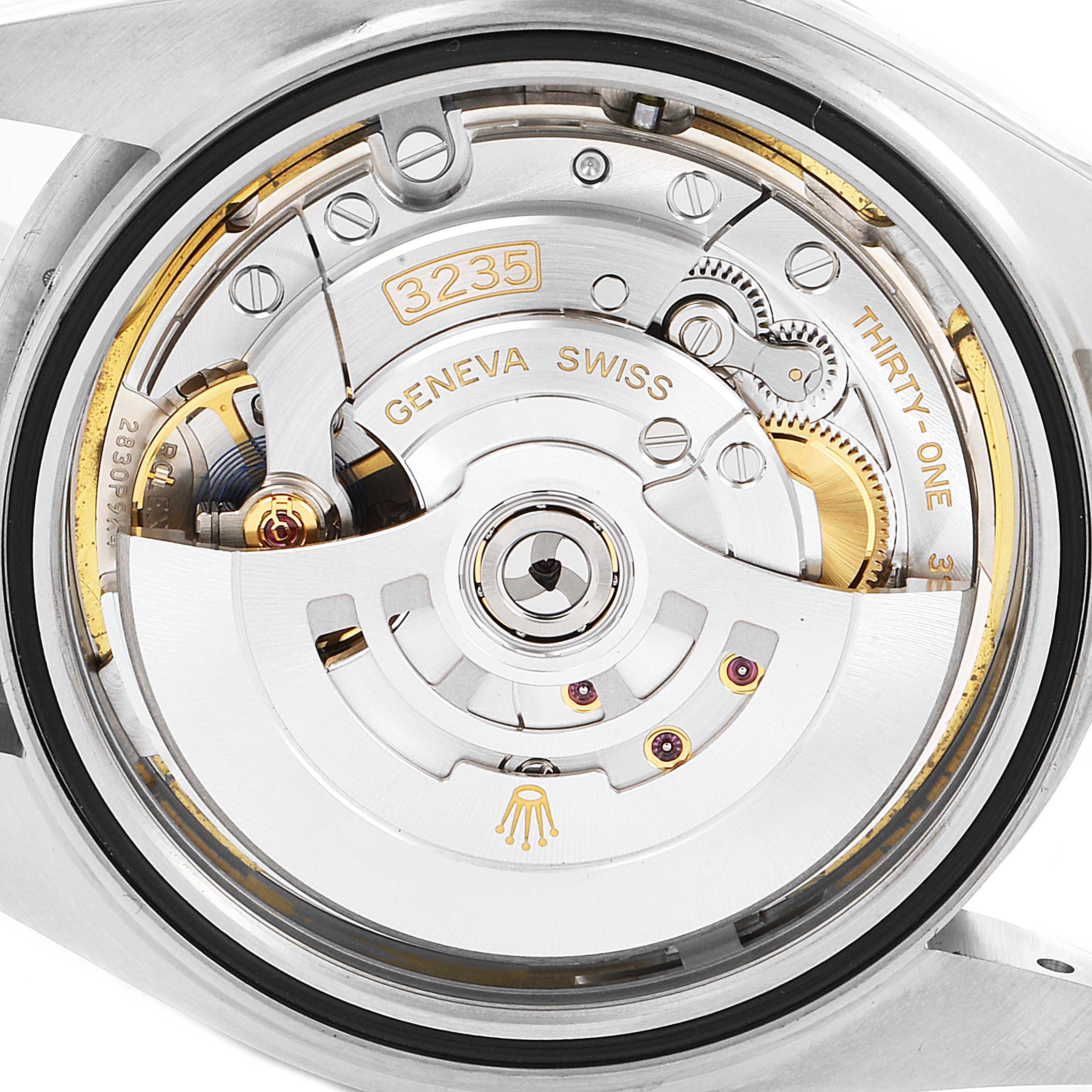 This image shows the back view of a Rolex Datejust 41 126334 Men
s Stainless Steel White Dial 126334 Men
s Stainless Steel White Dial watch, highlighting its inner mechanical movement.