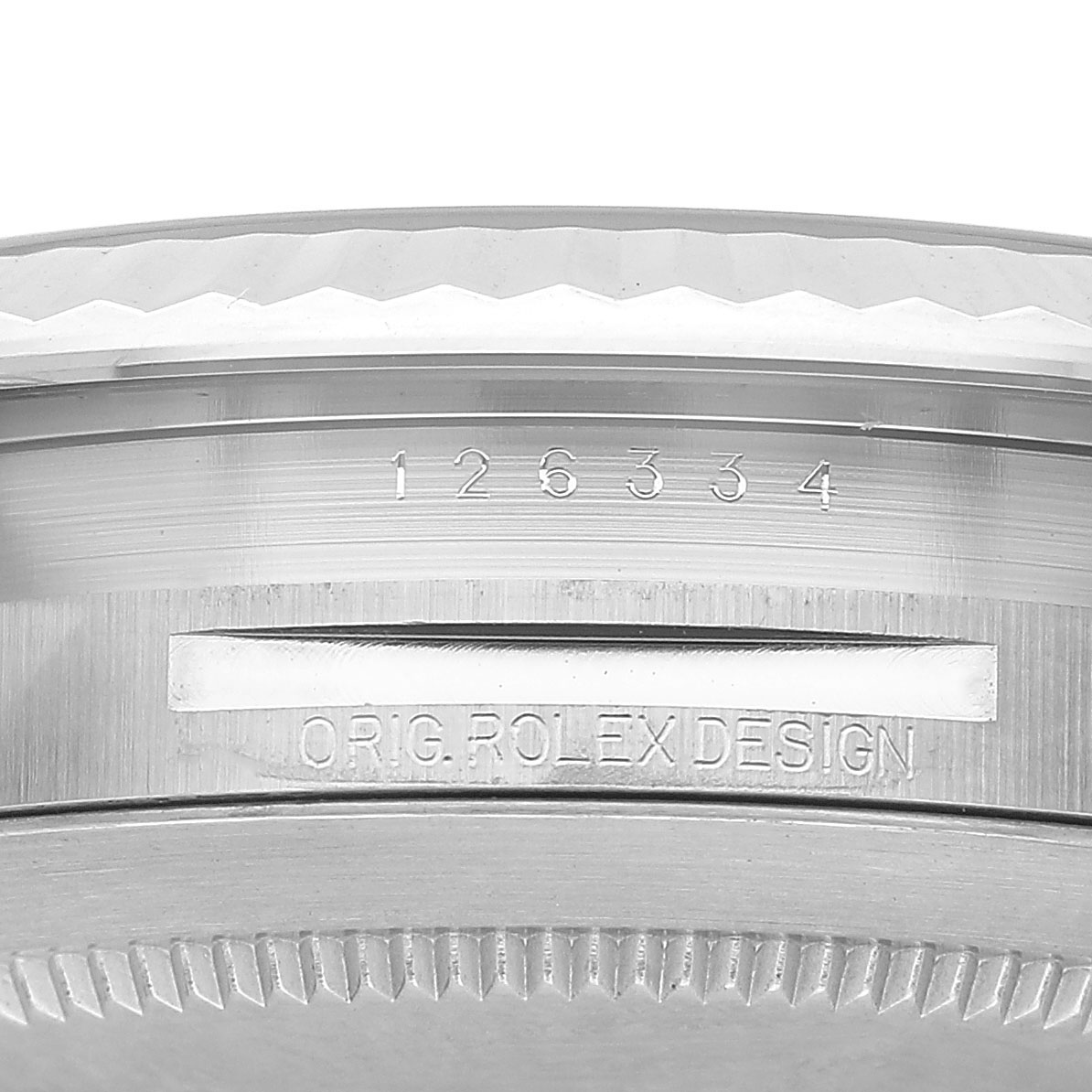 The image shows the side view of a Rolex Datejust 41 126334 Men's Stainless Steel White Dial, focusing on the engraved bezel and serial number details.