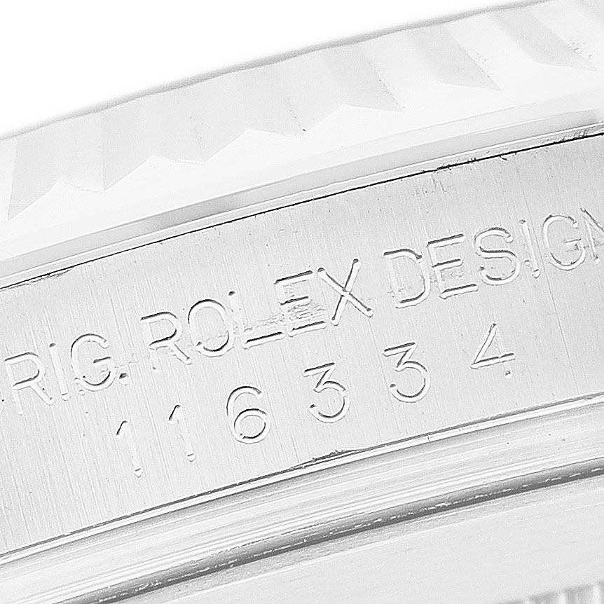 The image shows a close-up of the engraved Rolex Design number on the side of a Rolex Datejust 41 116334 Men's Stainless Steel Blue Dial watch case.