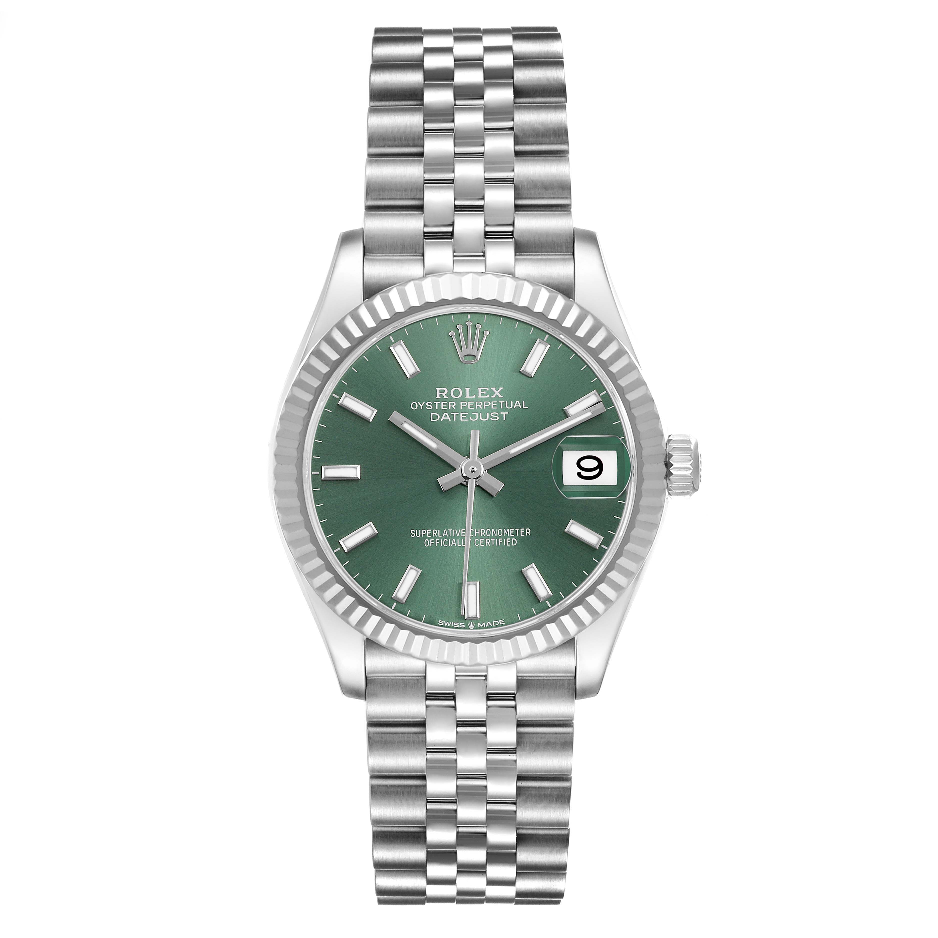 The Rolex Datejust Mid-Size watch is shown from the front, highlighting its green dial, date window, and jubilee bracelet.